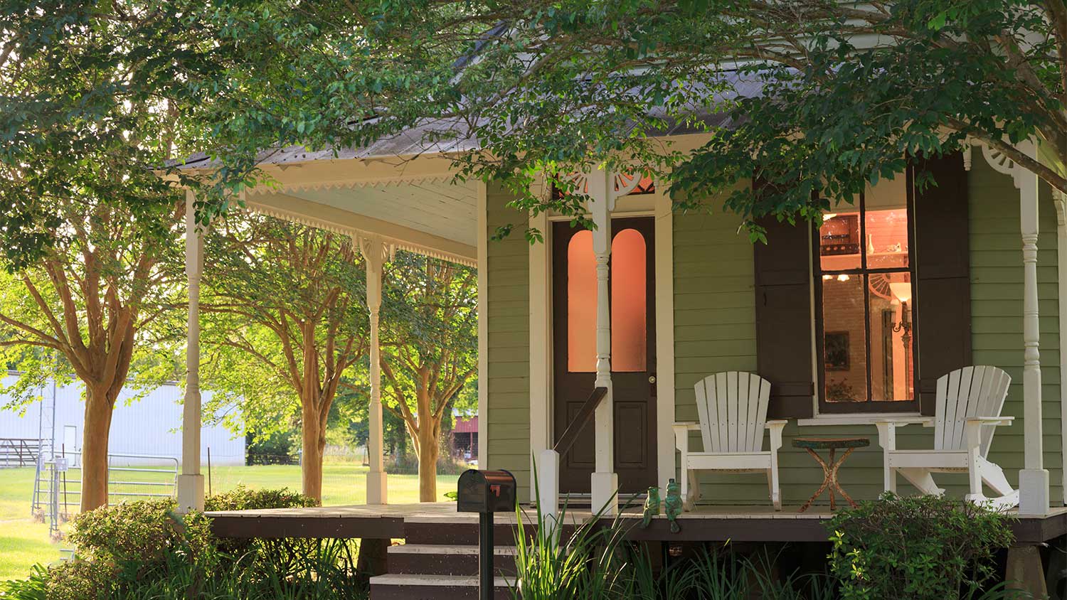 A view of a roof-covered porch