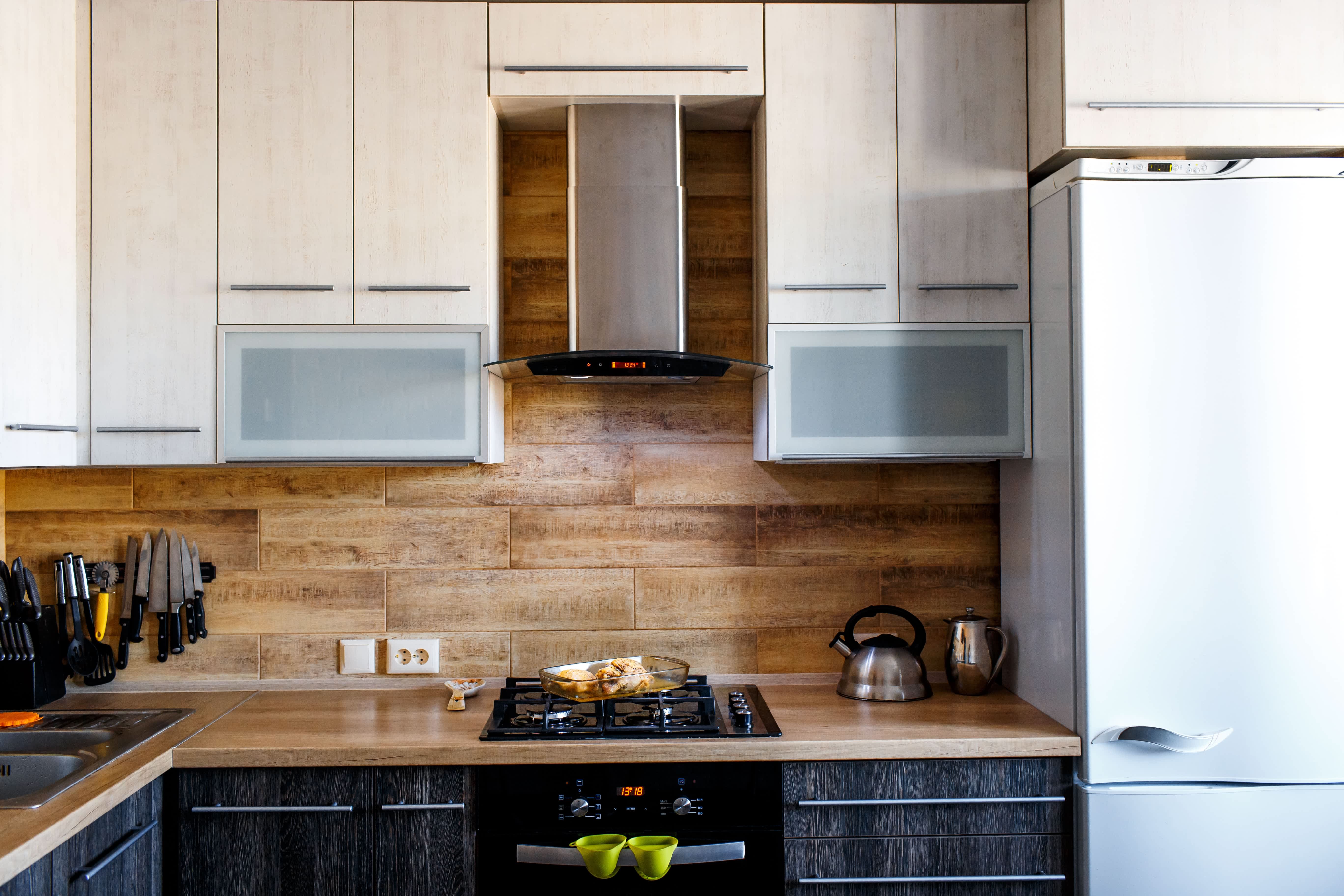 Frosted glass upper cabinet doors in kitchenette