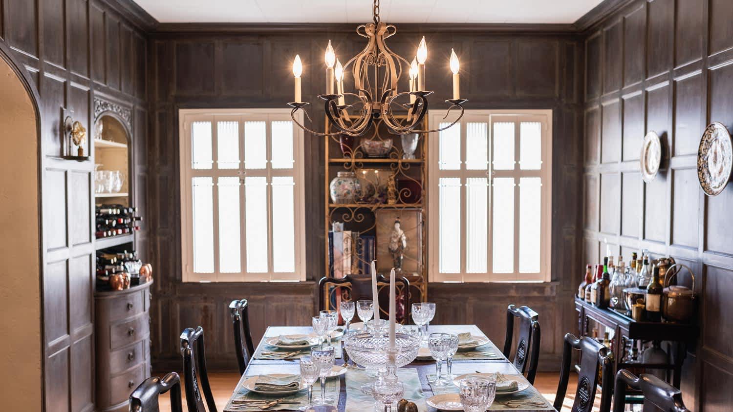 A set table at the dining room of a historic home