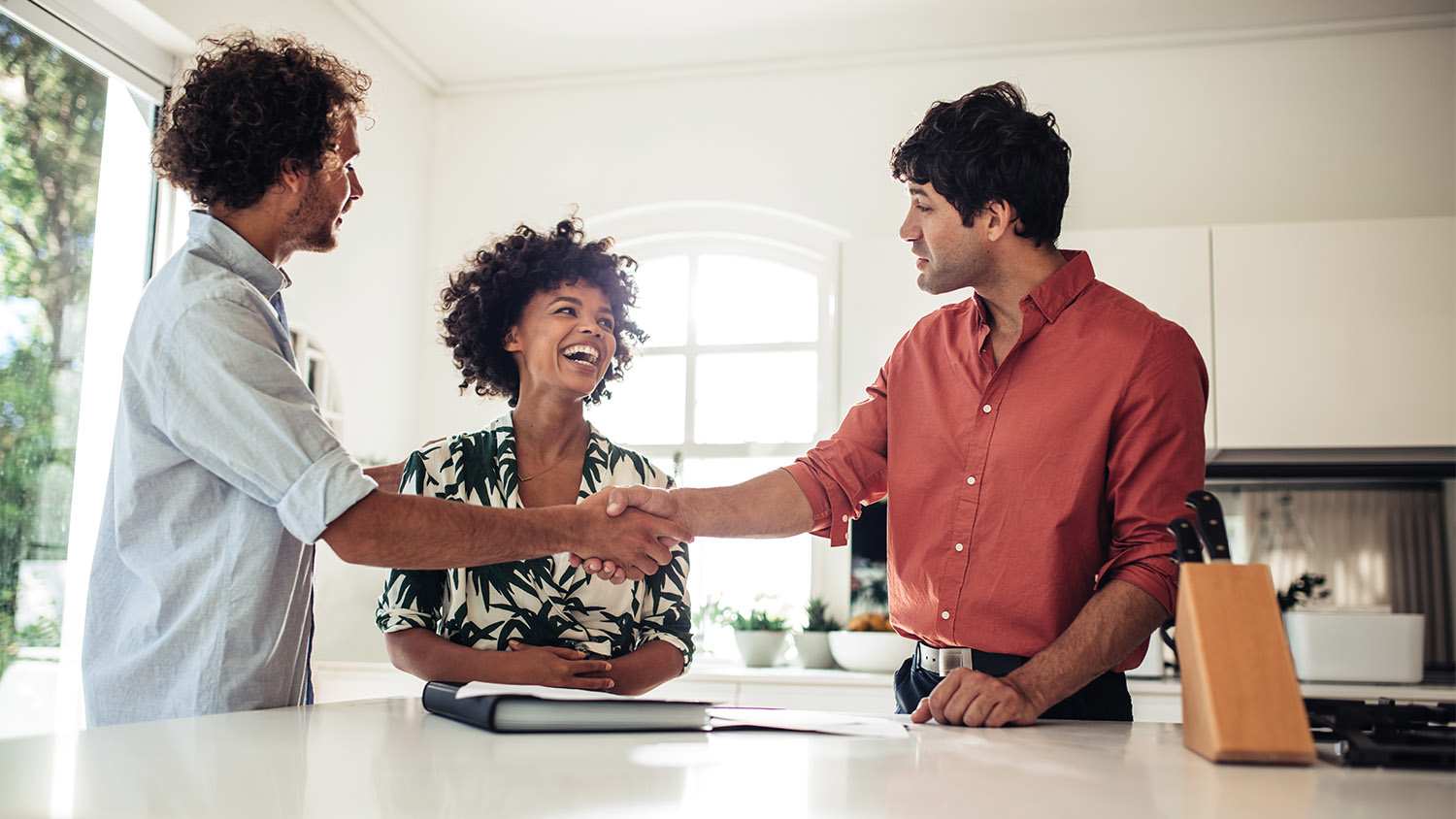 real estate broker with couple