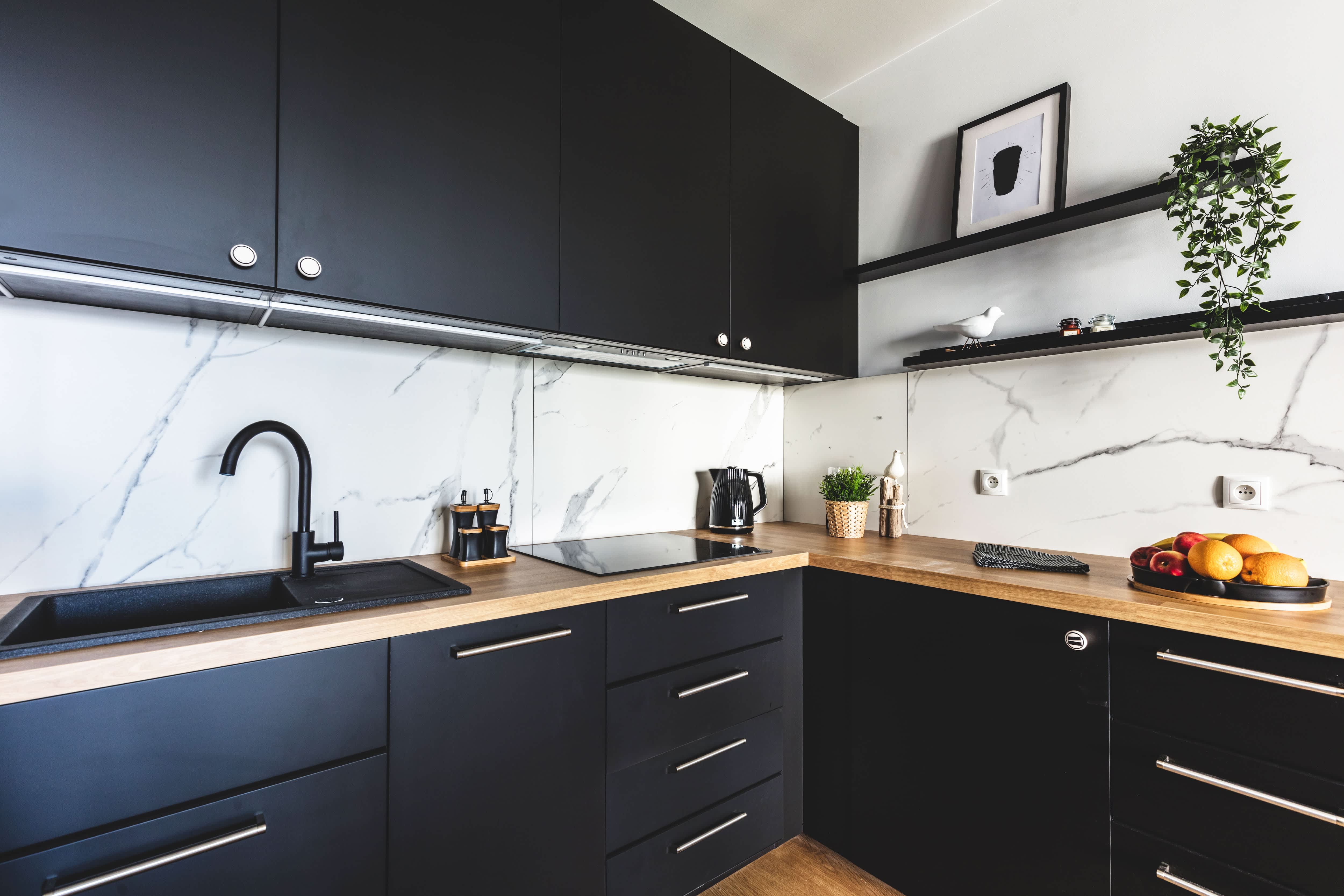 Black cabinets in small modern kitchen