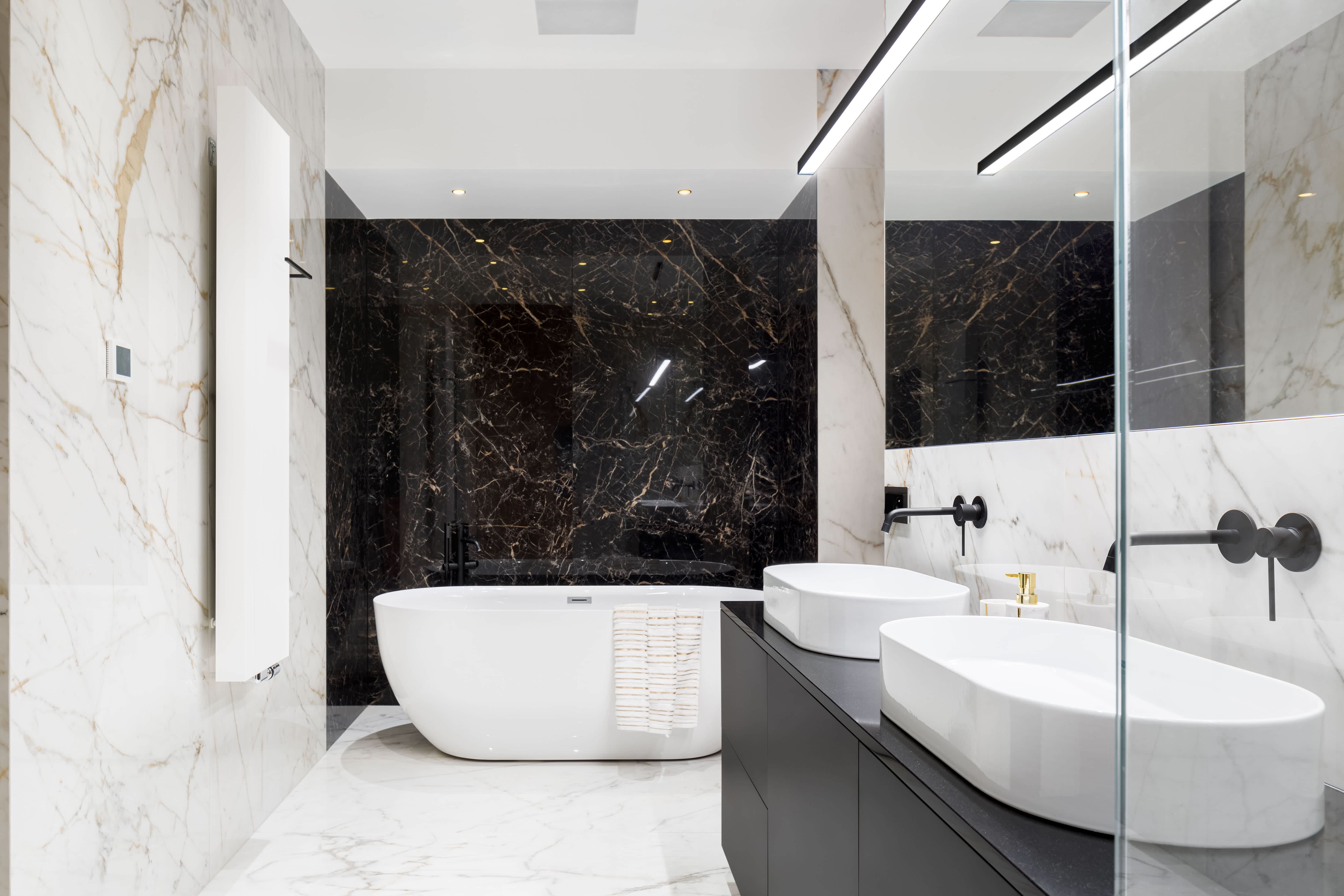 Black and white stonework in elegant modern bathroom