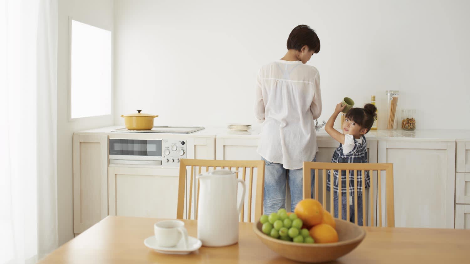 Mother cooking with her daughter