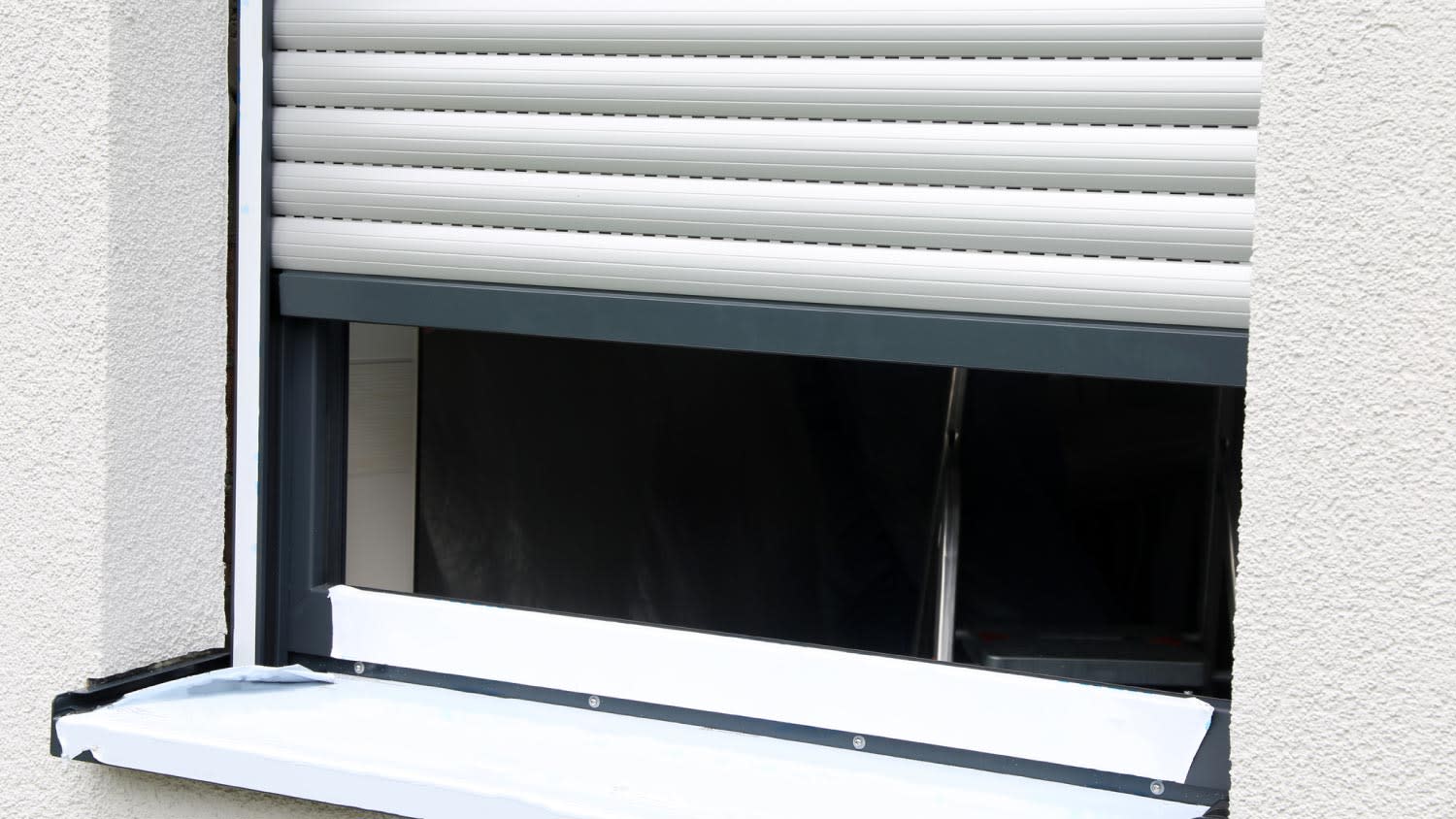Newly installed window with roller shutter
