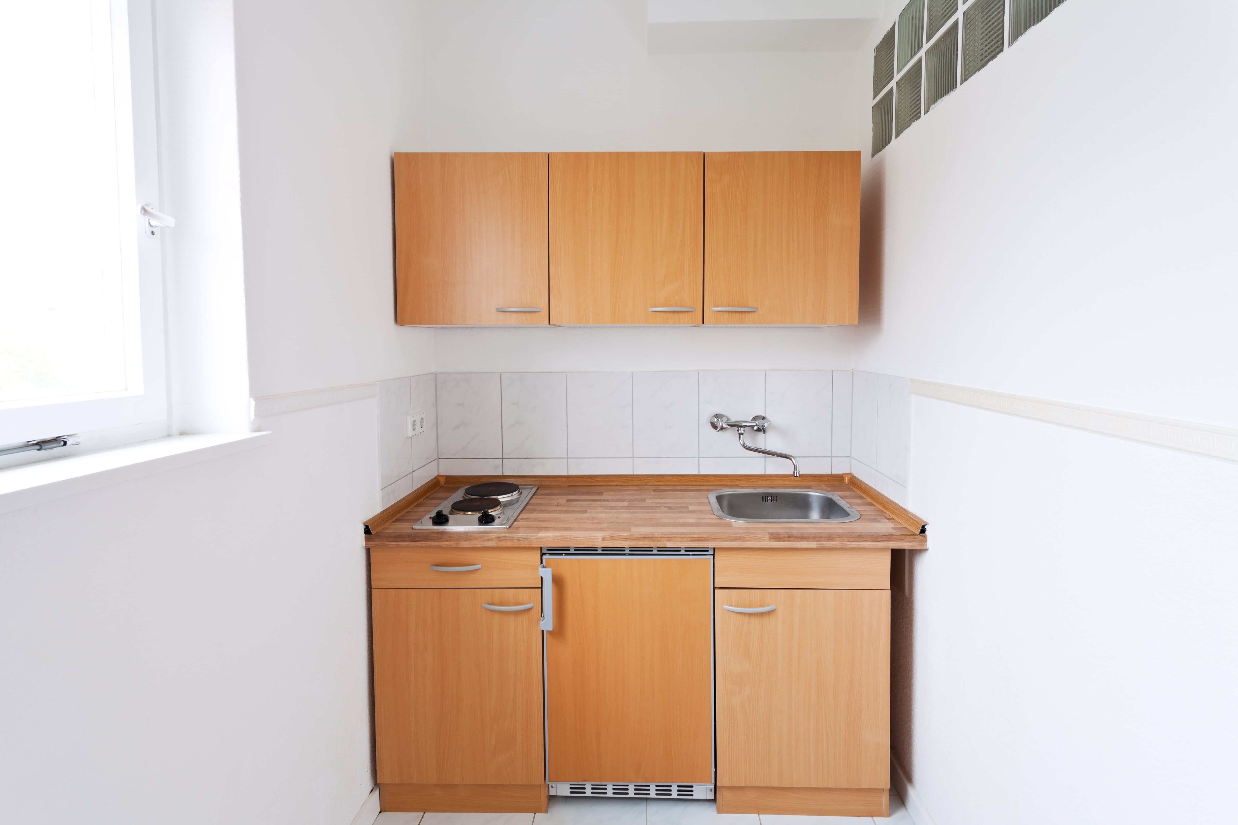 Small kitchenette featuring small appliances
