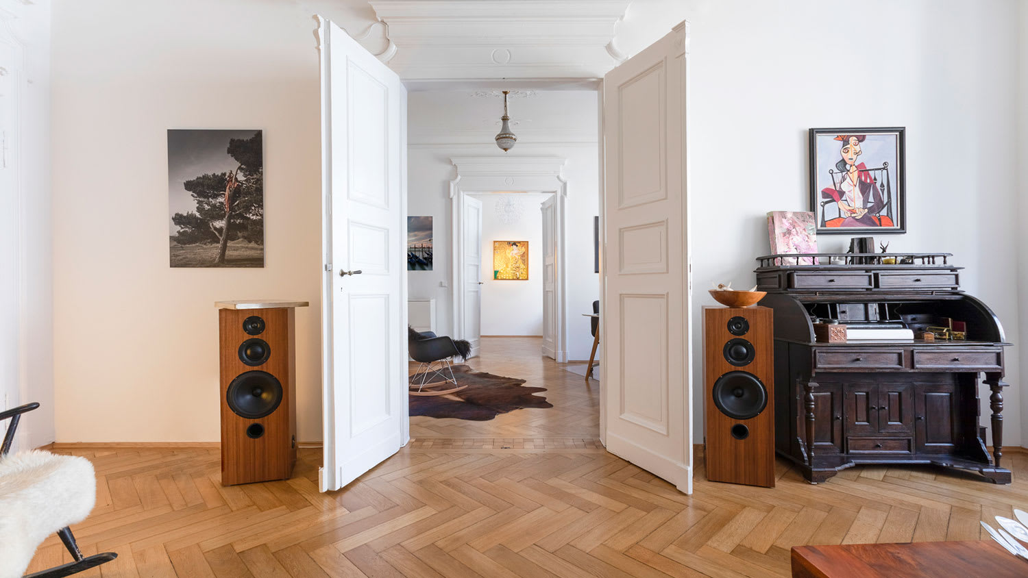 Apartment living room with open doors and hardwood floor