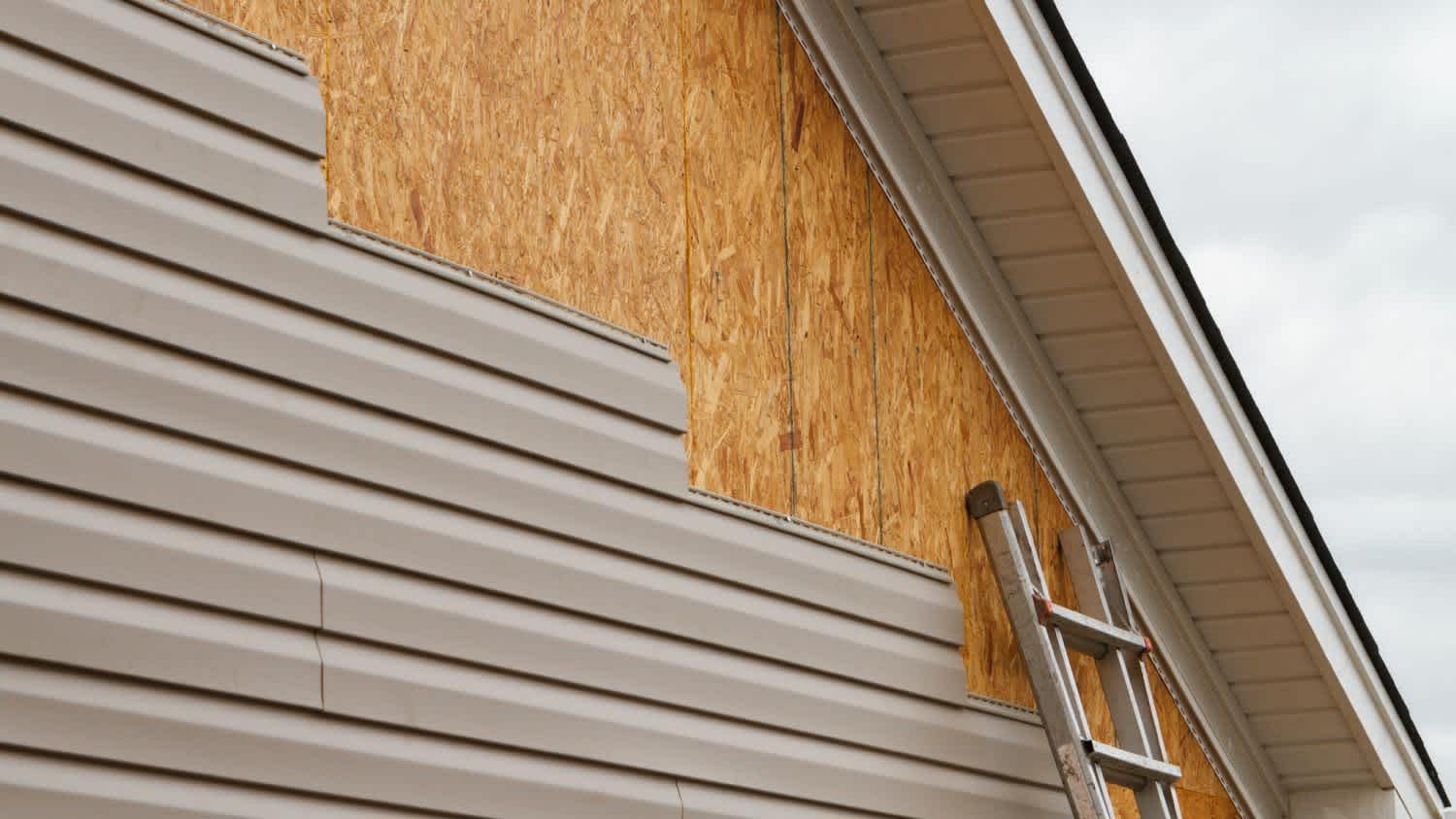 Vinyl siding installation on a house