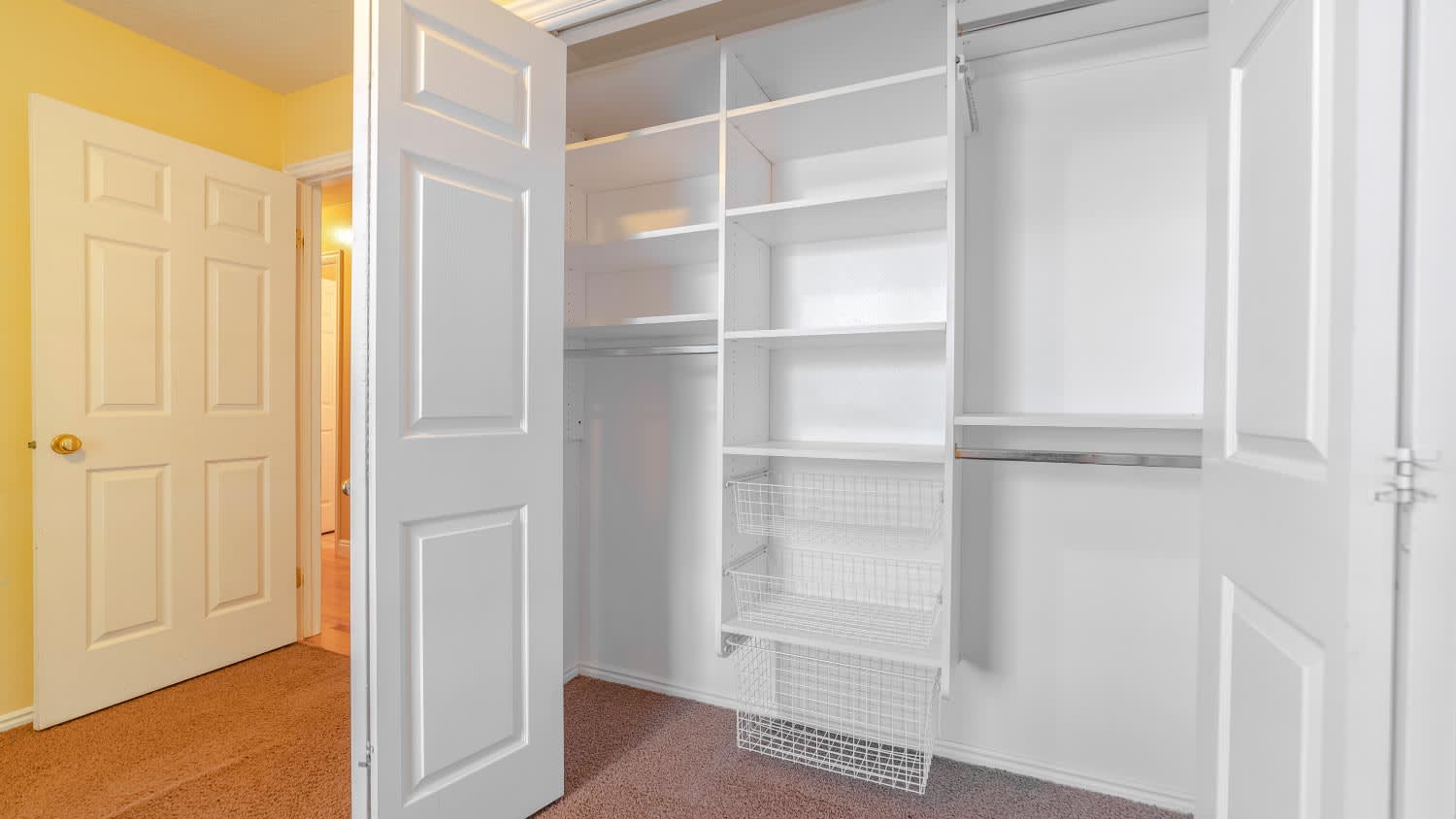 Empty white built closet