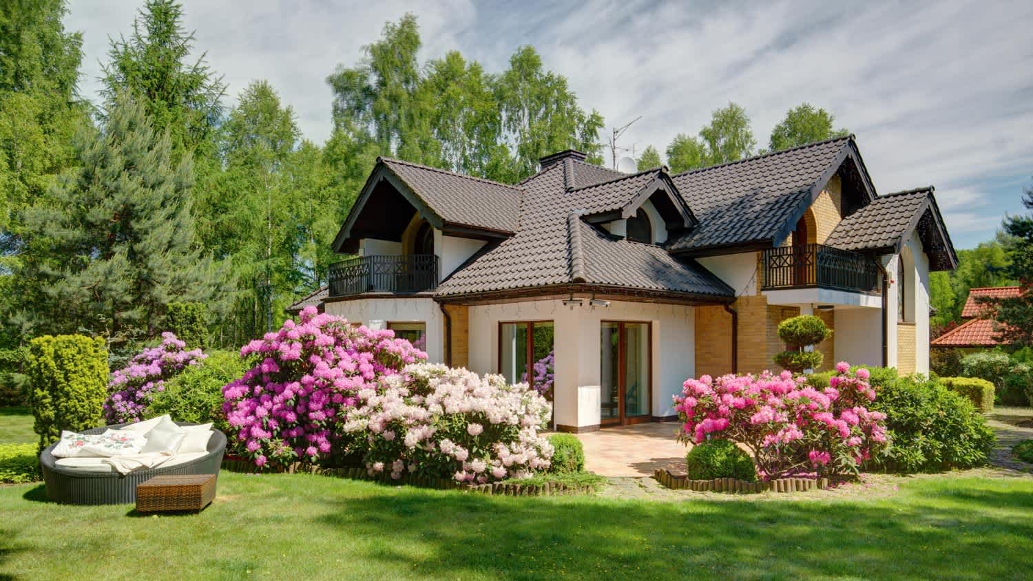 A beautiful house with a lush garden