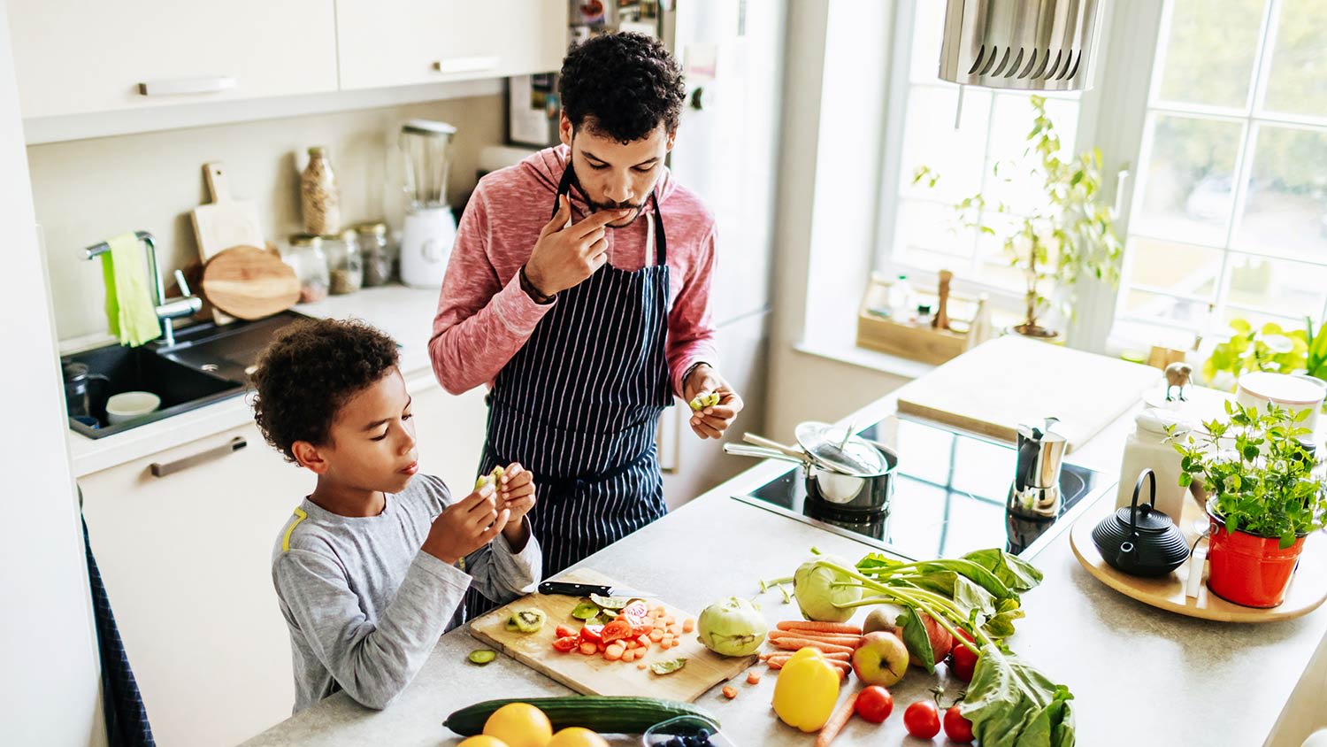 Father and sun fix a meal