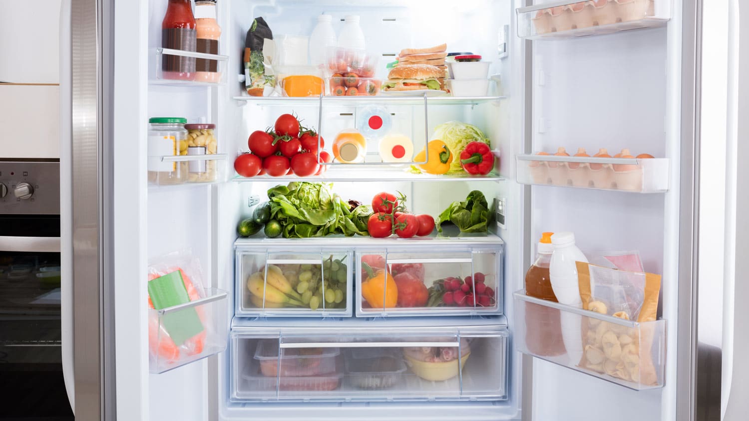A refrigerator filled with fruits and vegetables