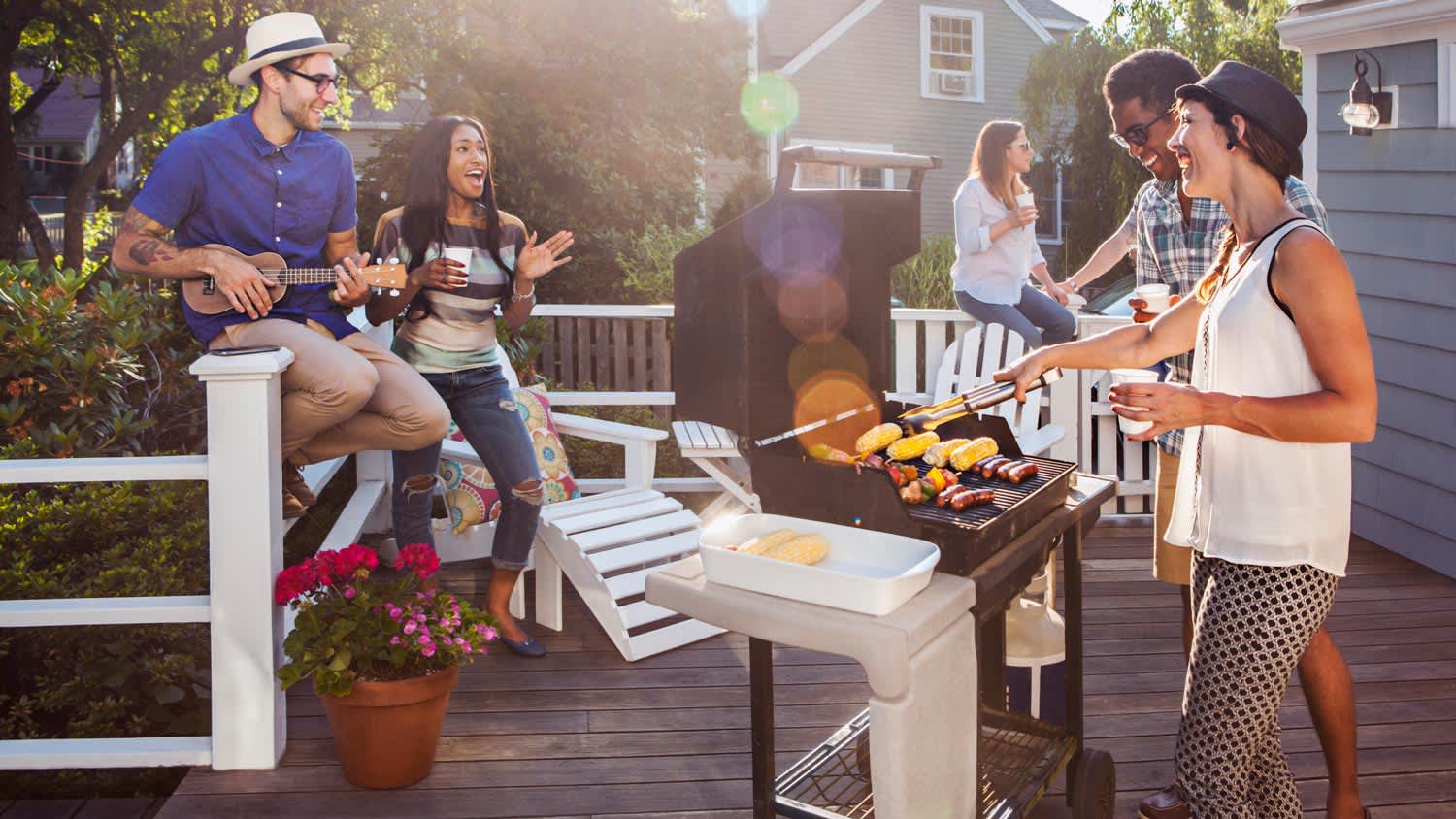 Friends having barbecue on a patio