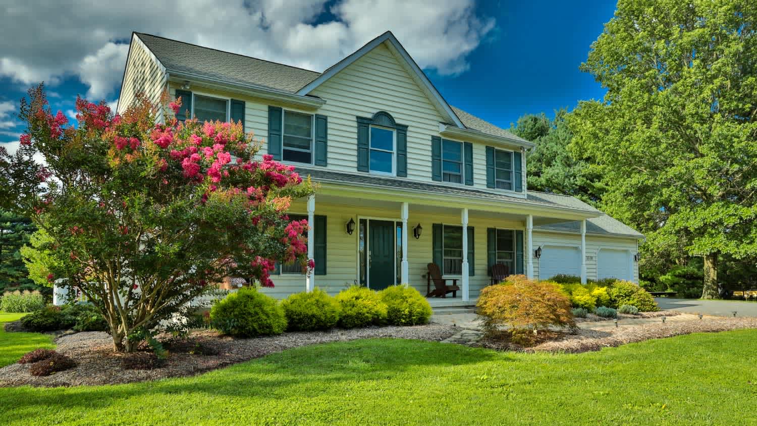 Single family home with landscaping