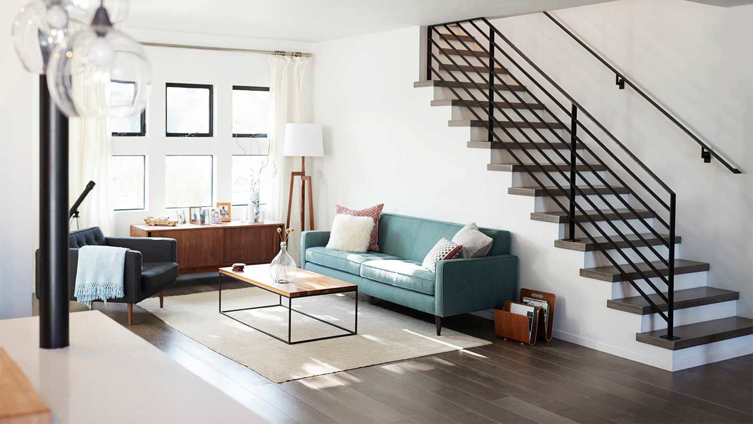 contemporary living room with staircase