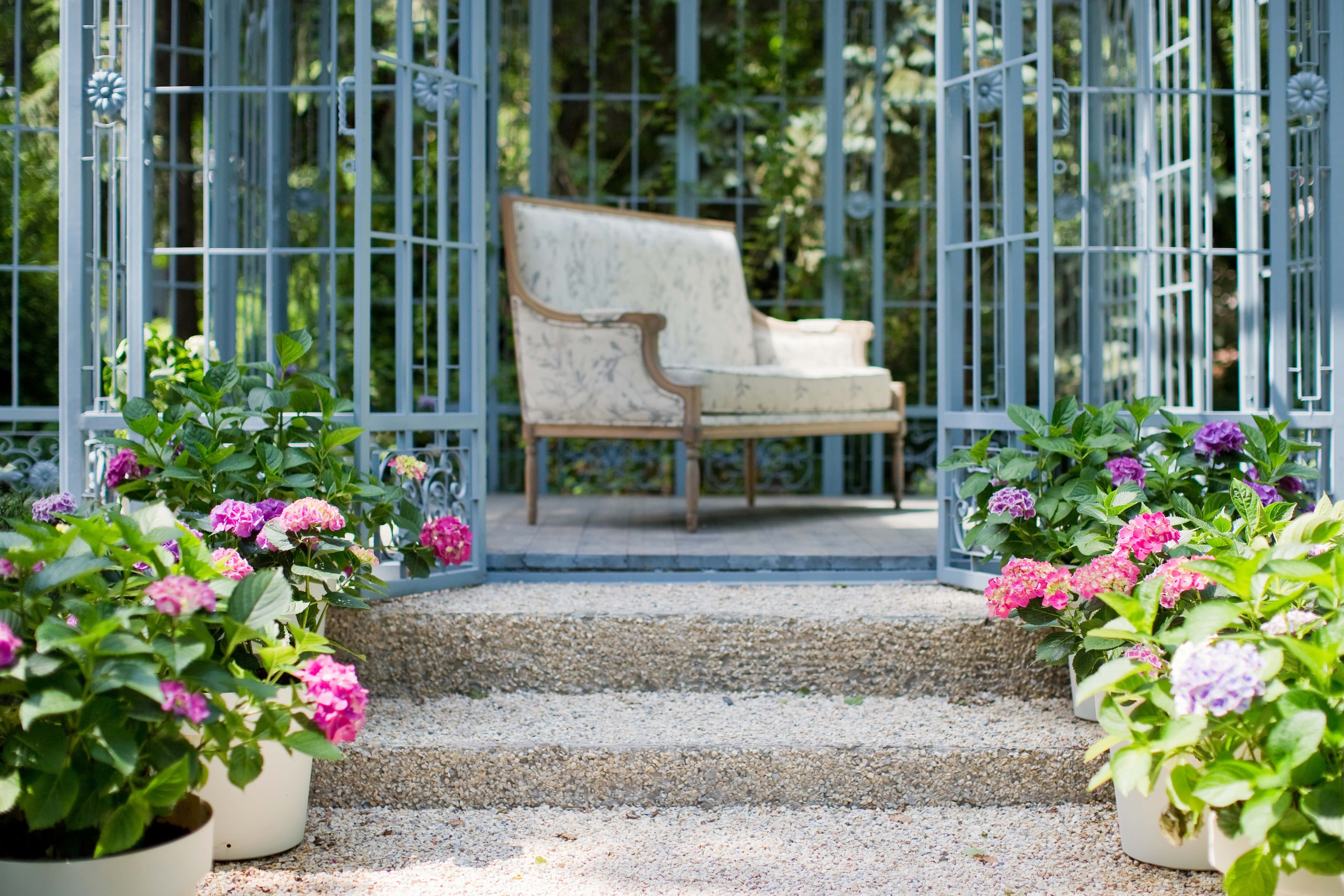 Painted metal gazebo in yard