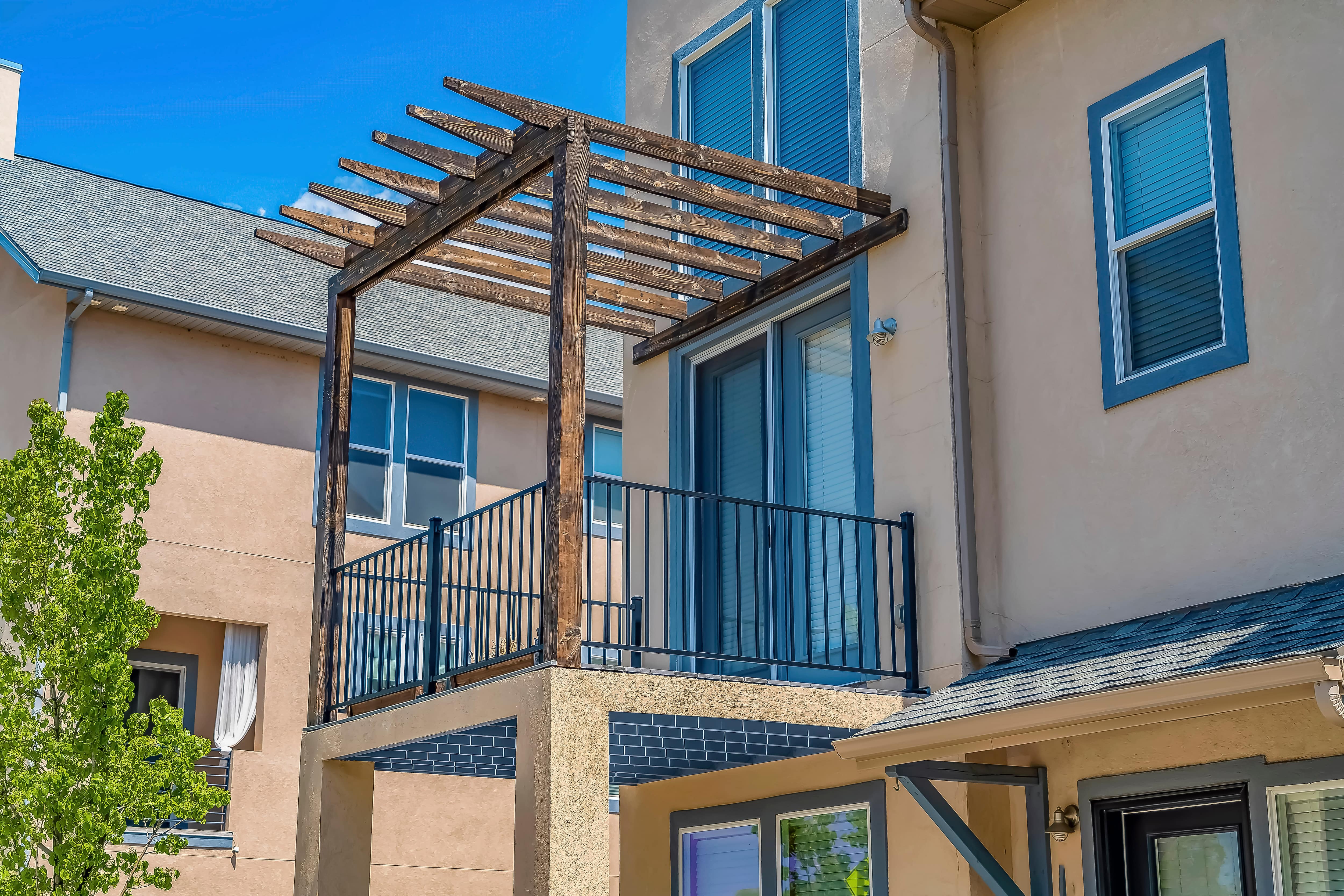 Pergola covering small balcony