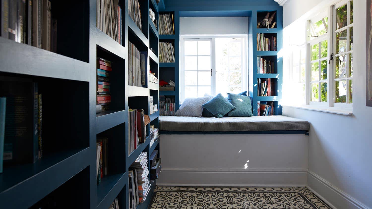 A walk-in closet transformed into a reading room