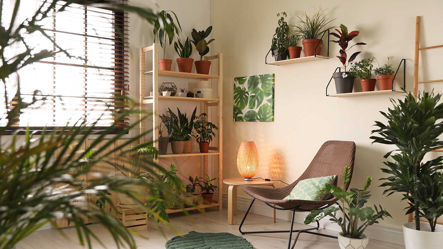 Stylish room interior with multiple plants and a lounge chair