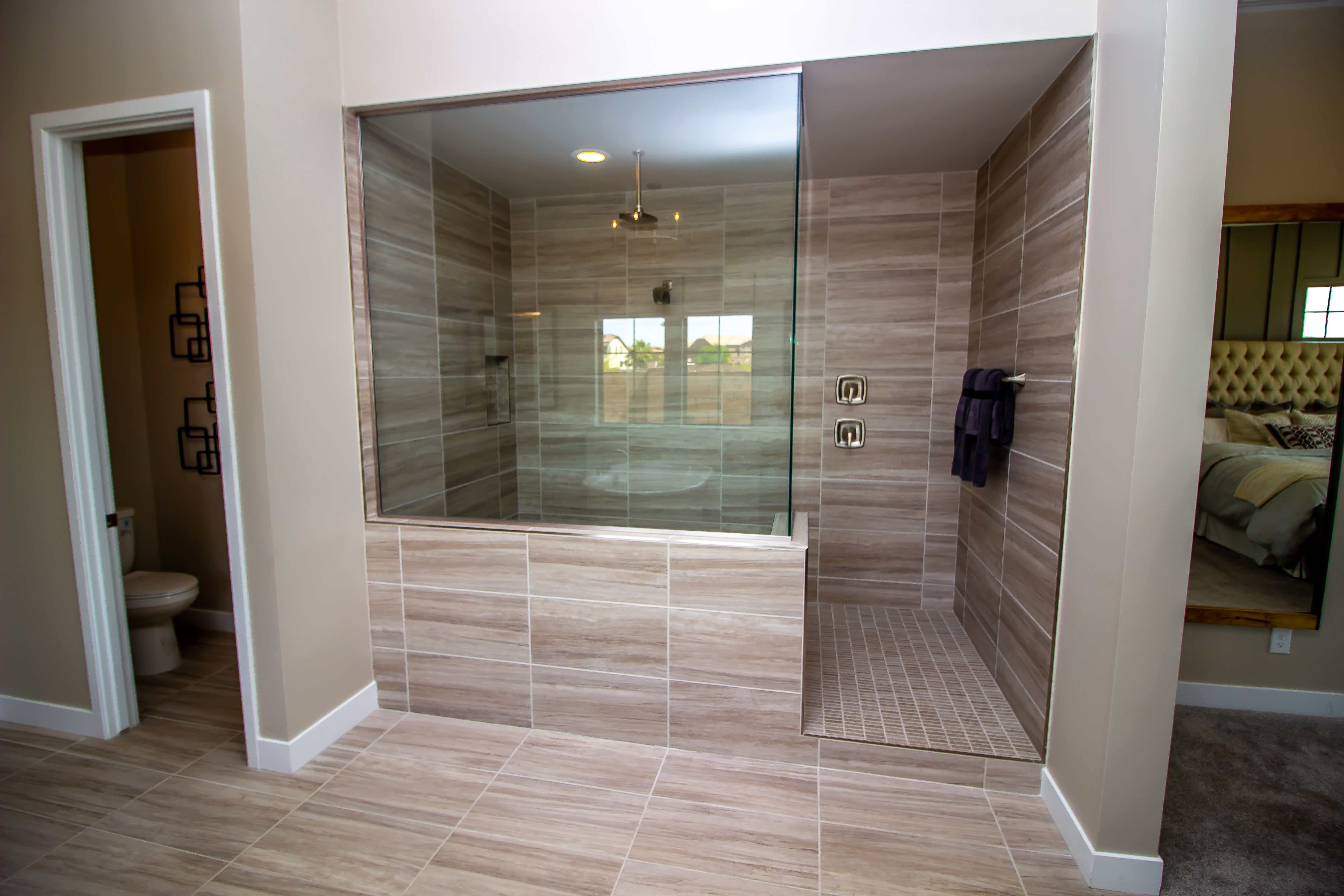 An ensuite shower room with a separate water closet