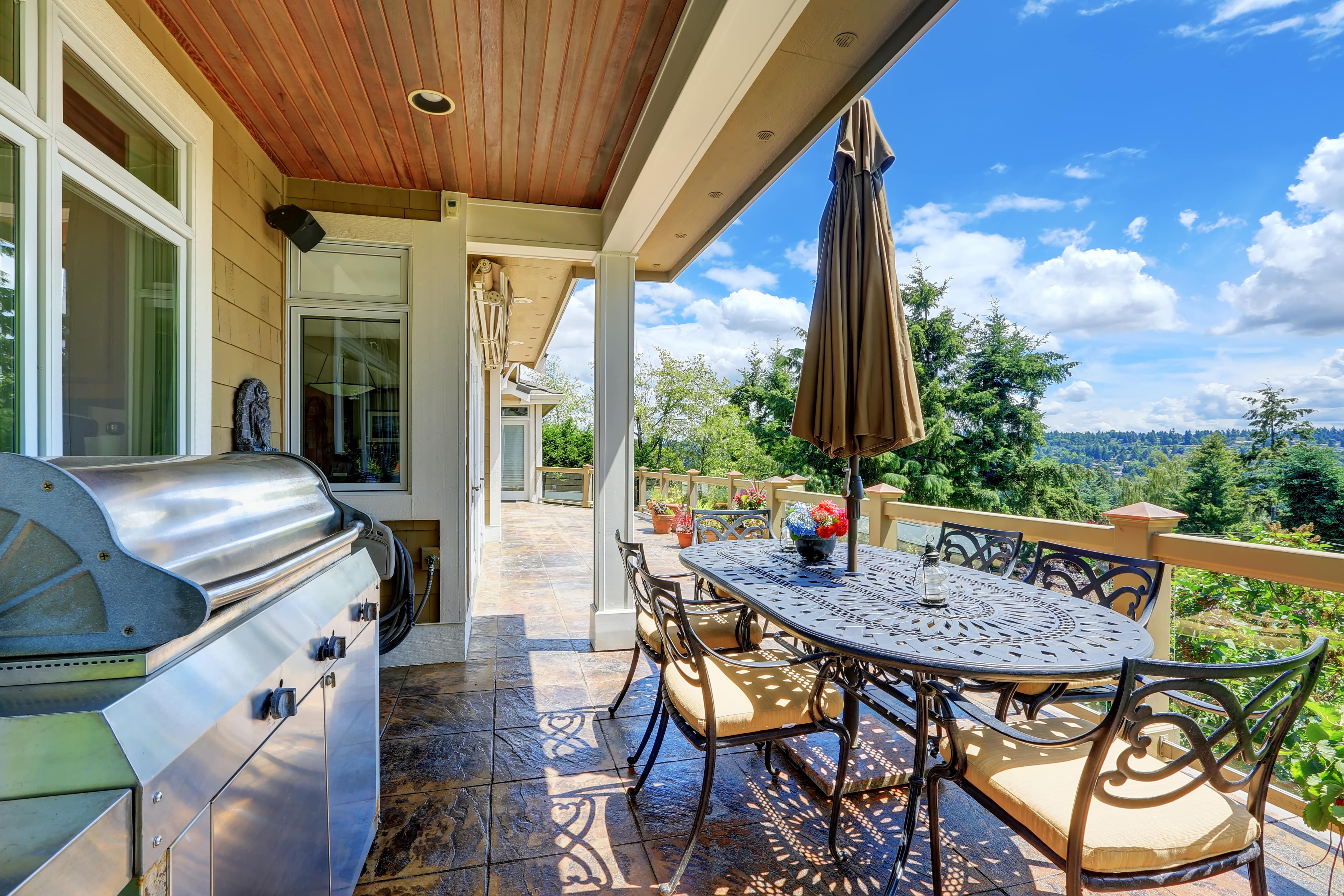 Glass panel railing system on back porch