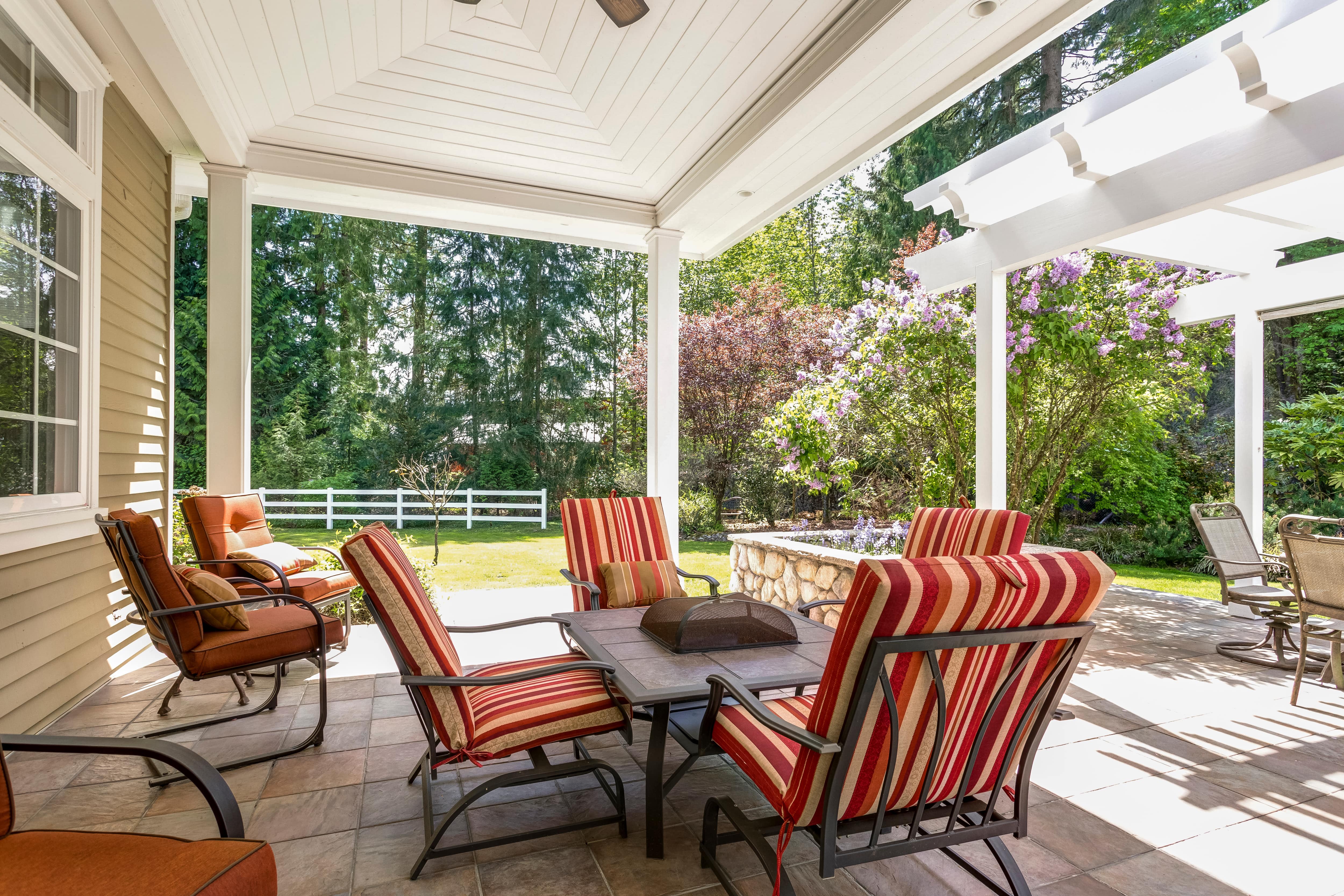 Fire pit table with outdoor patio chairs