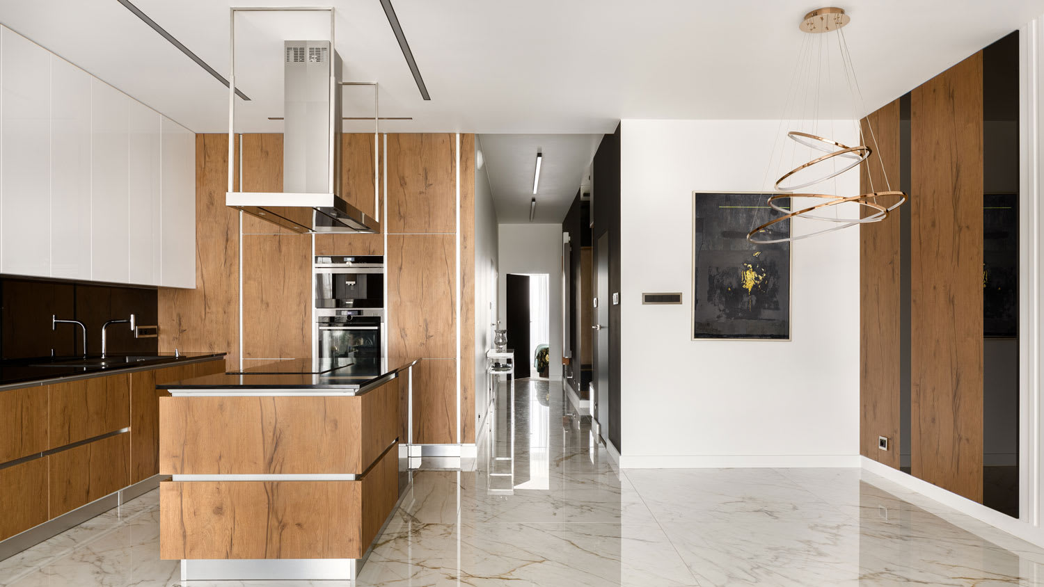 A spacious kitchen with marble flooring