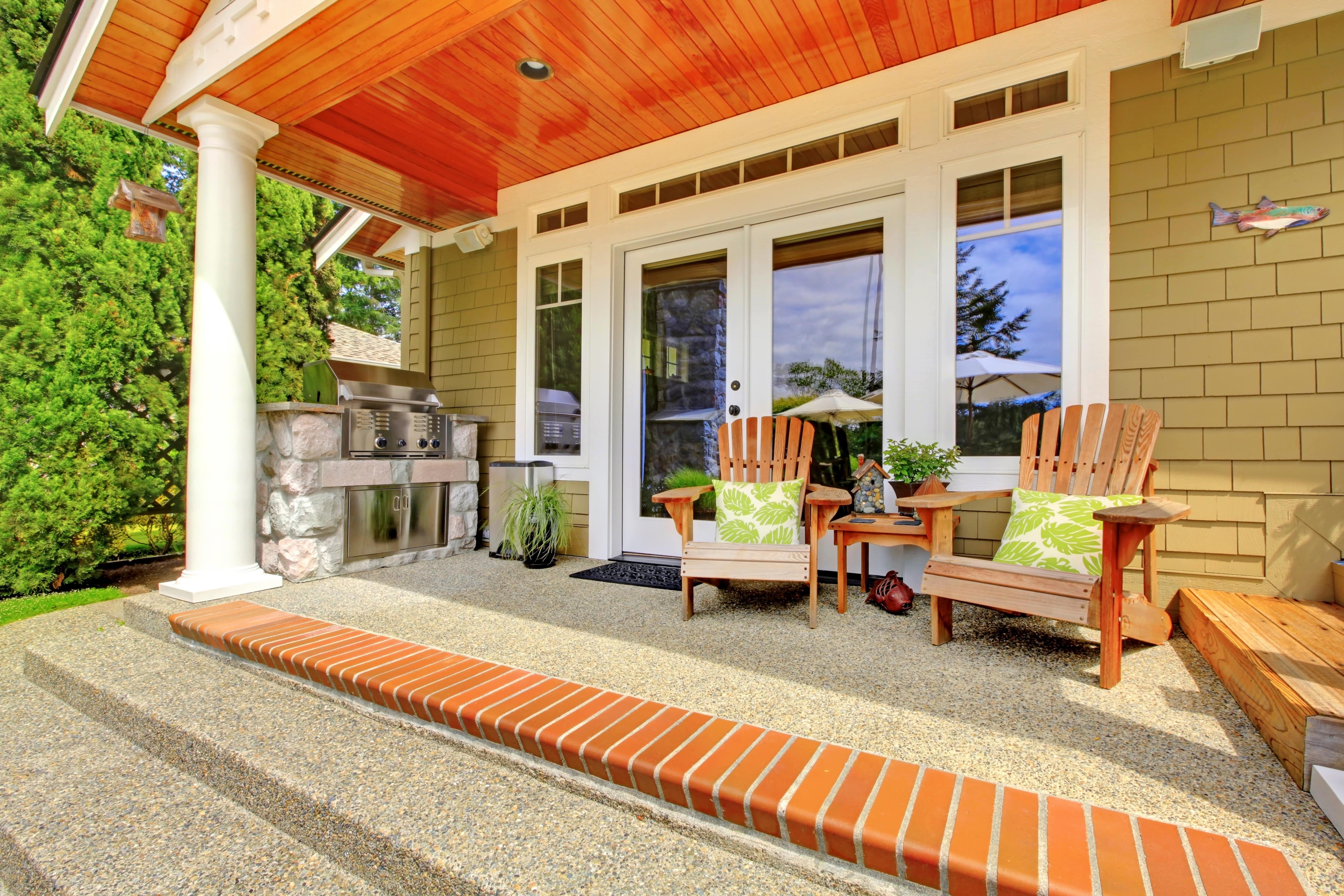 Back porch with adirondack chairs