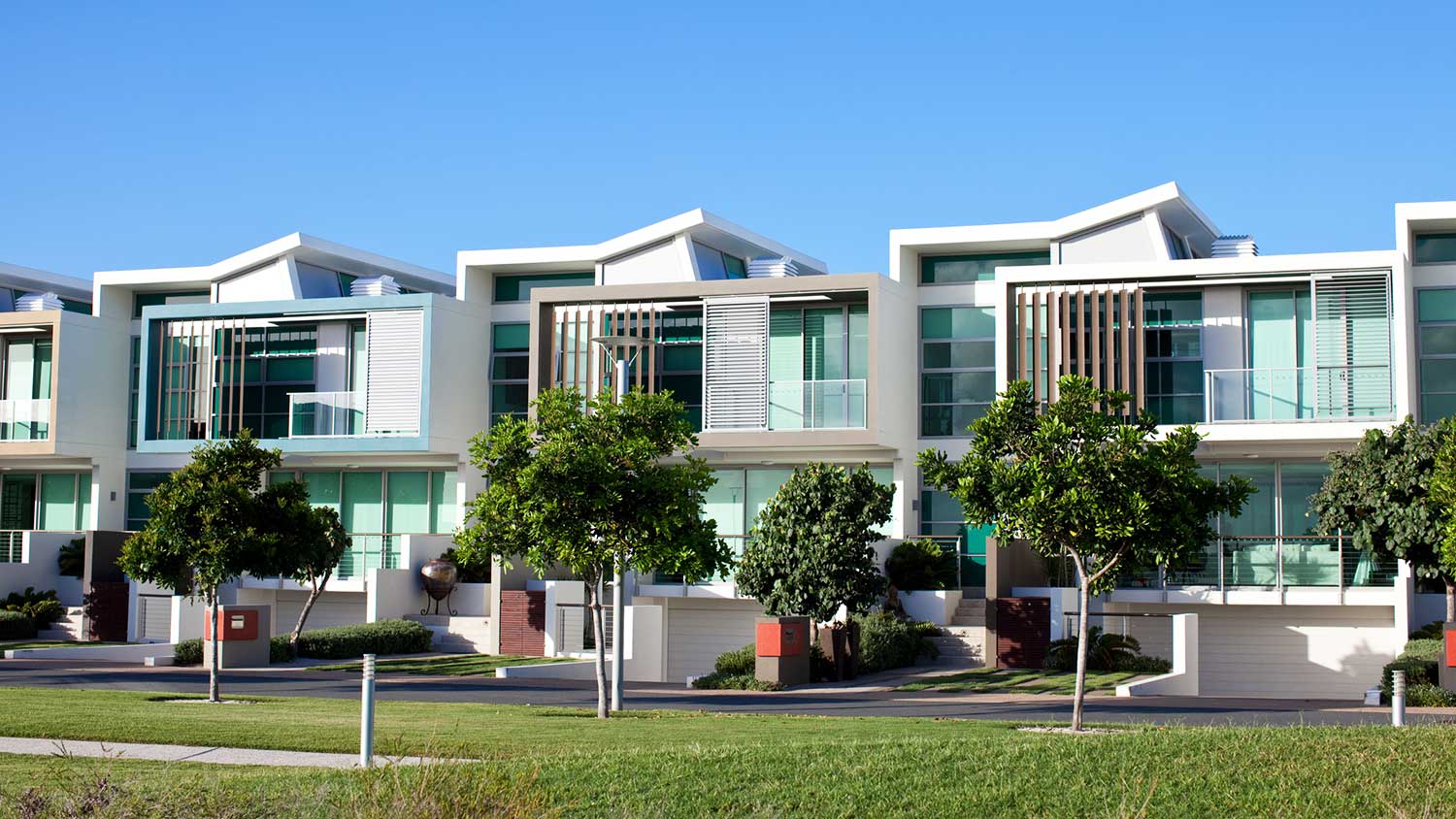 Exterior view of a row of modern condominiums