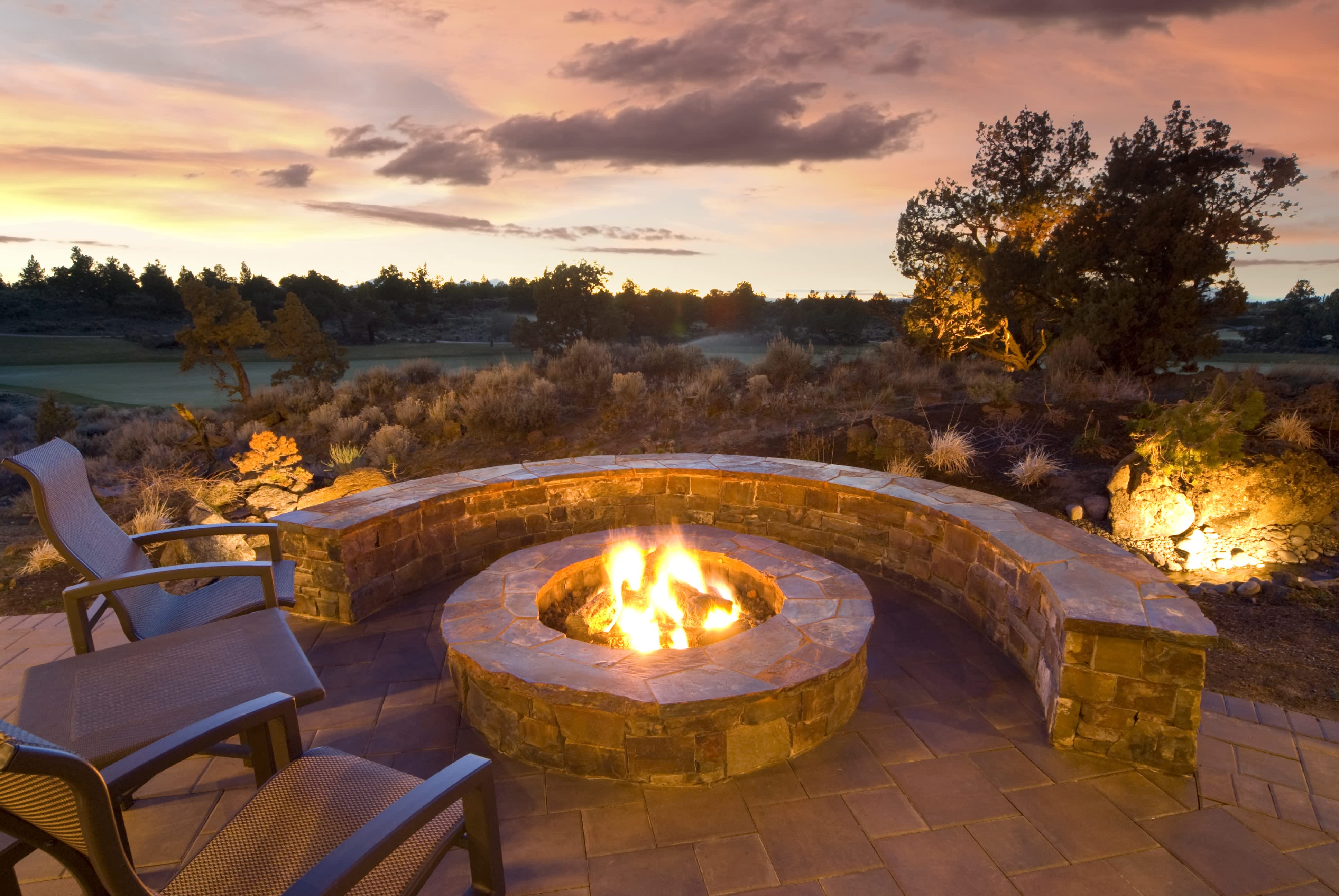 Stone fire pit and bench seating