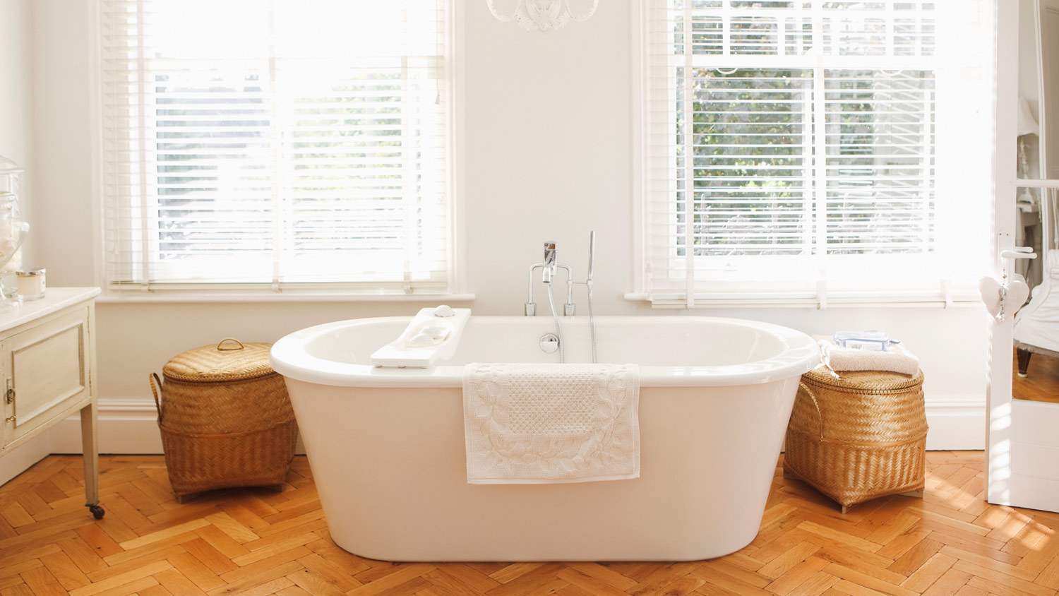 A modern bathtub in a sunlit bathroom