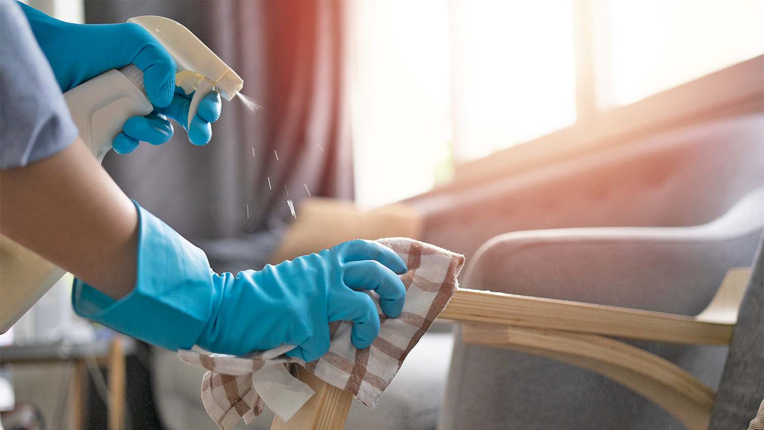 Clean living room chair gloves and spray