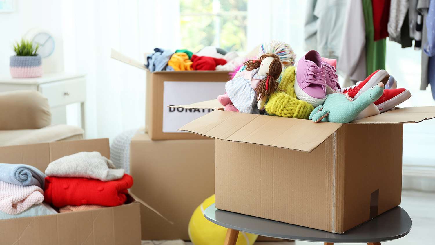 Donation boxes full with clothes and toys