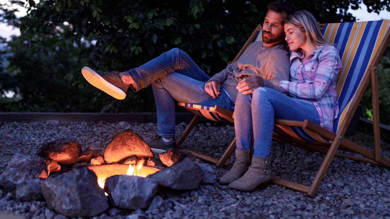 couple enjoying bonfire