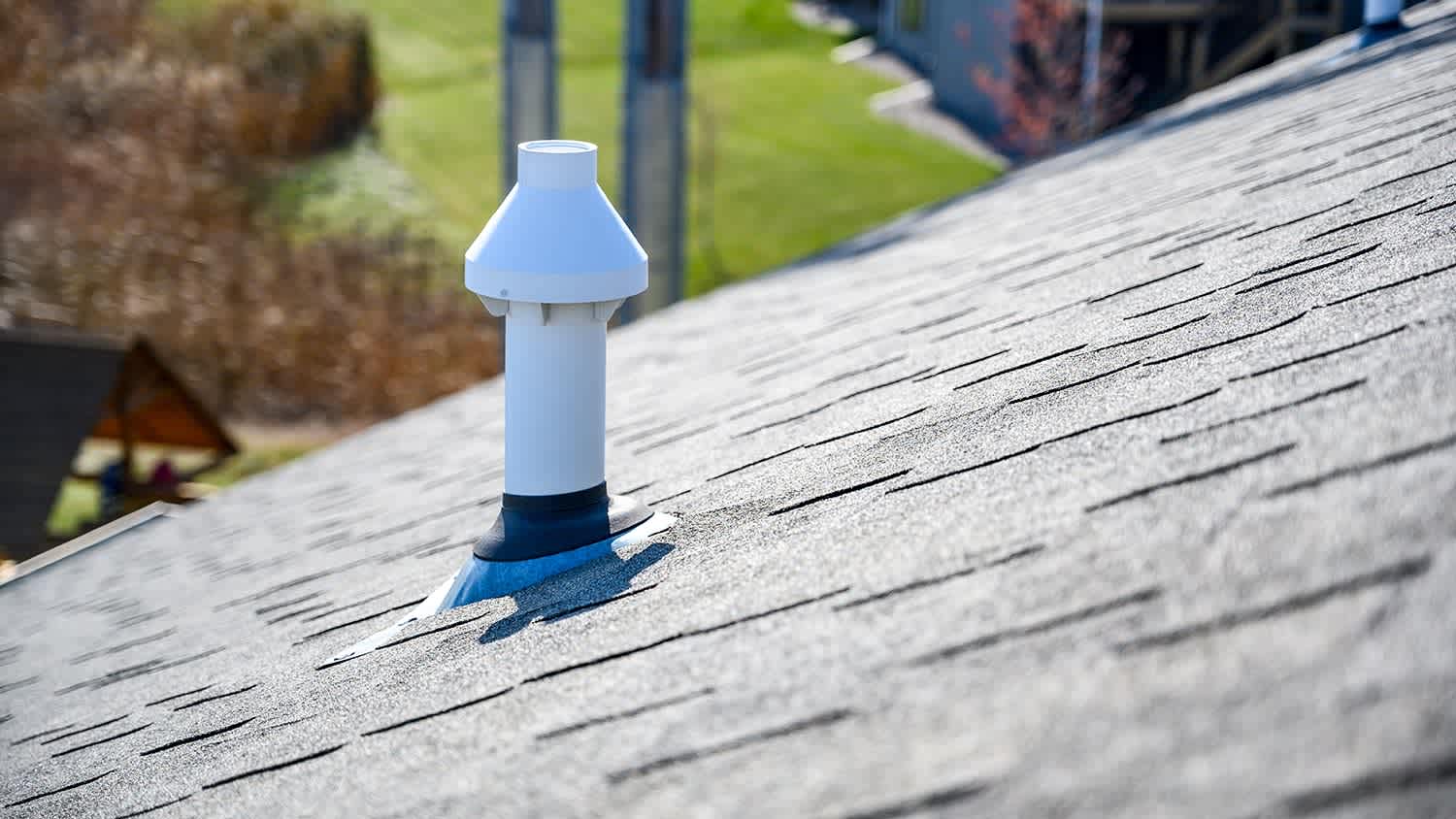 Sewer exhaust with boot on roof