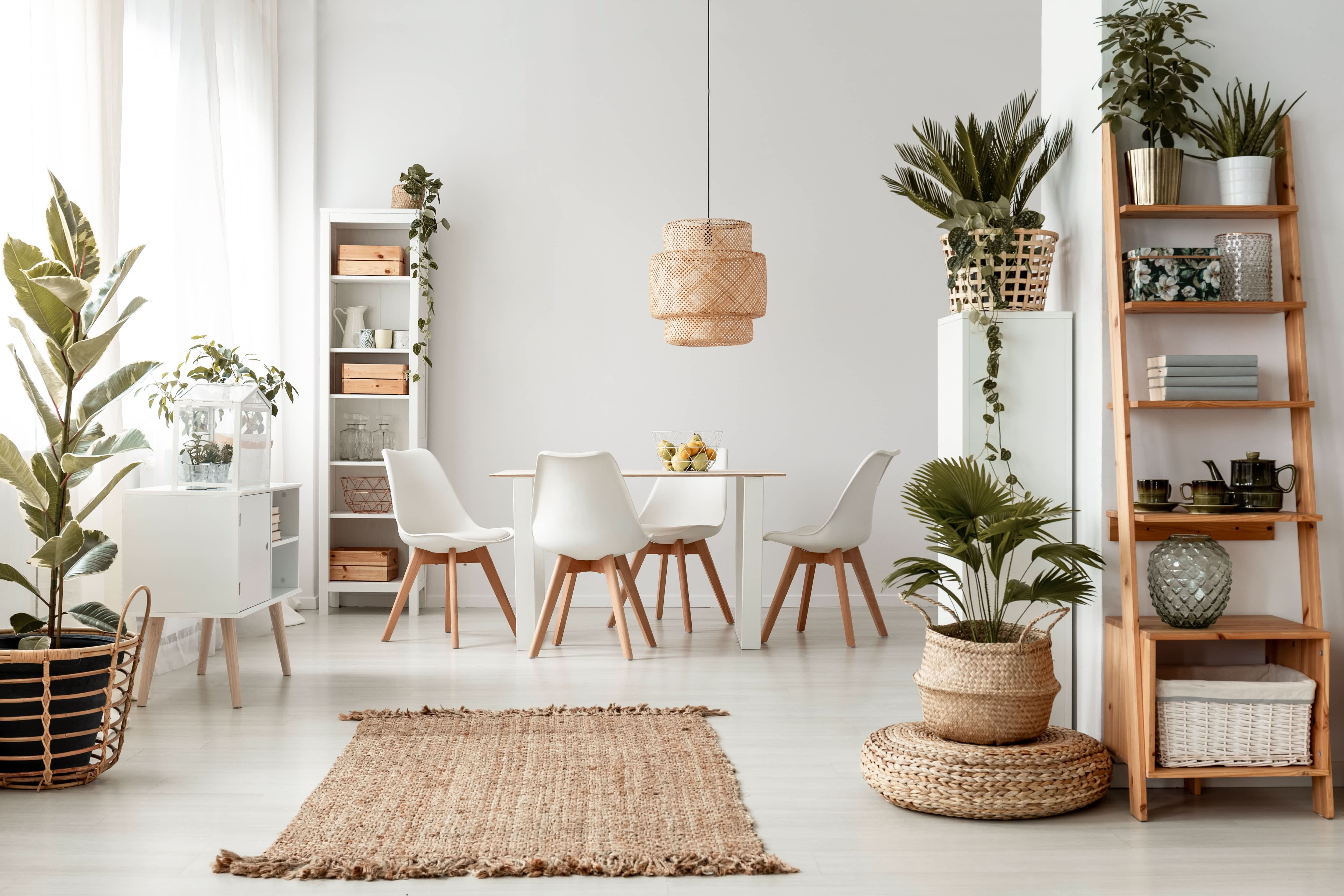 Woven rattan pendant light in white modern dining room