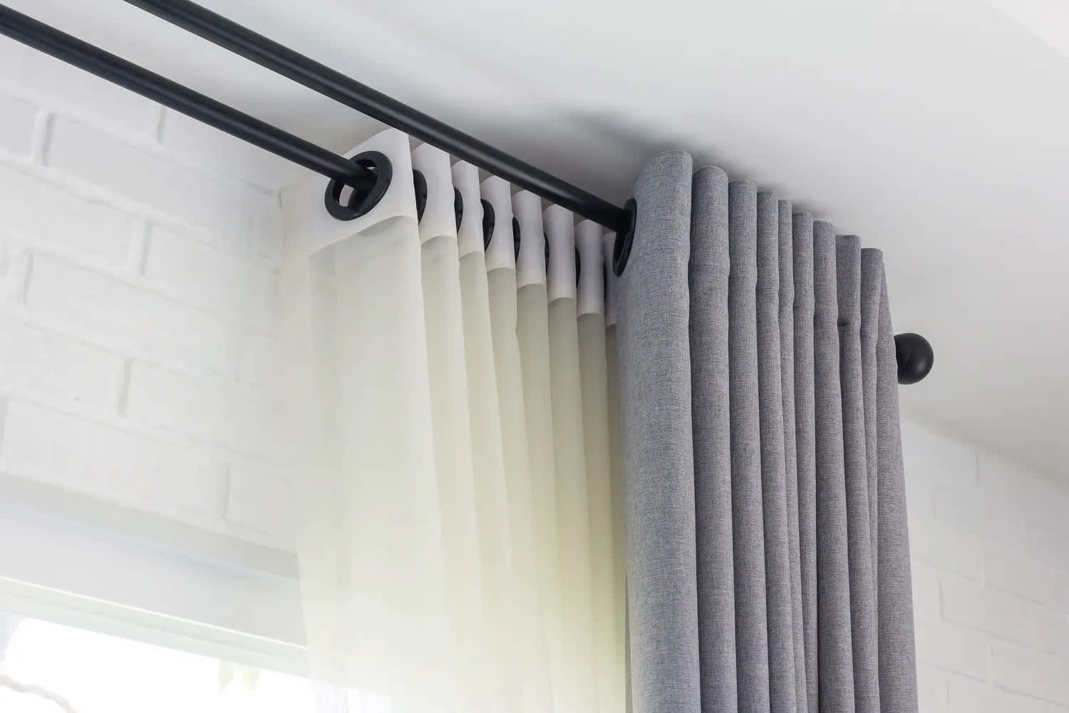 Close up of curtains on rods