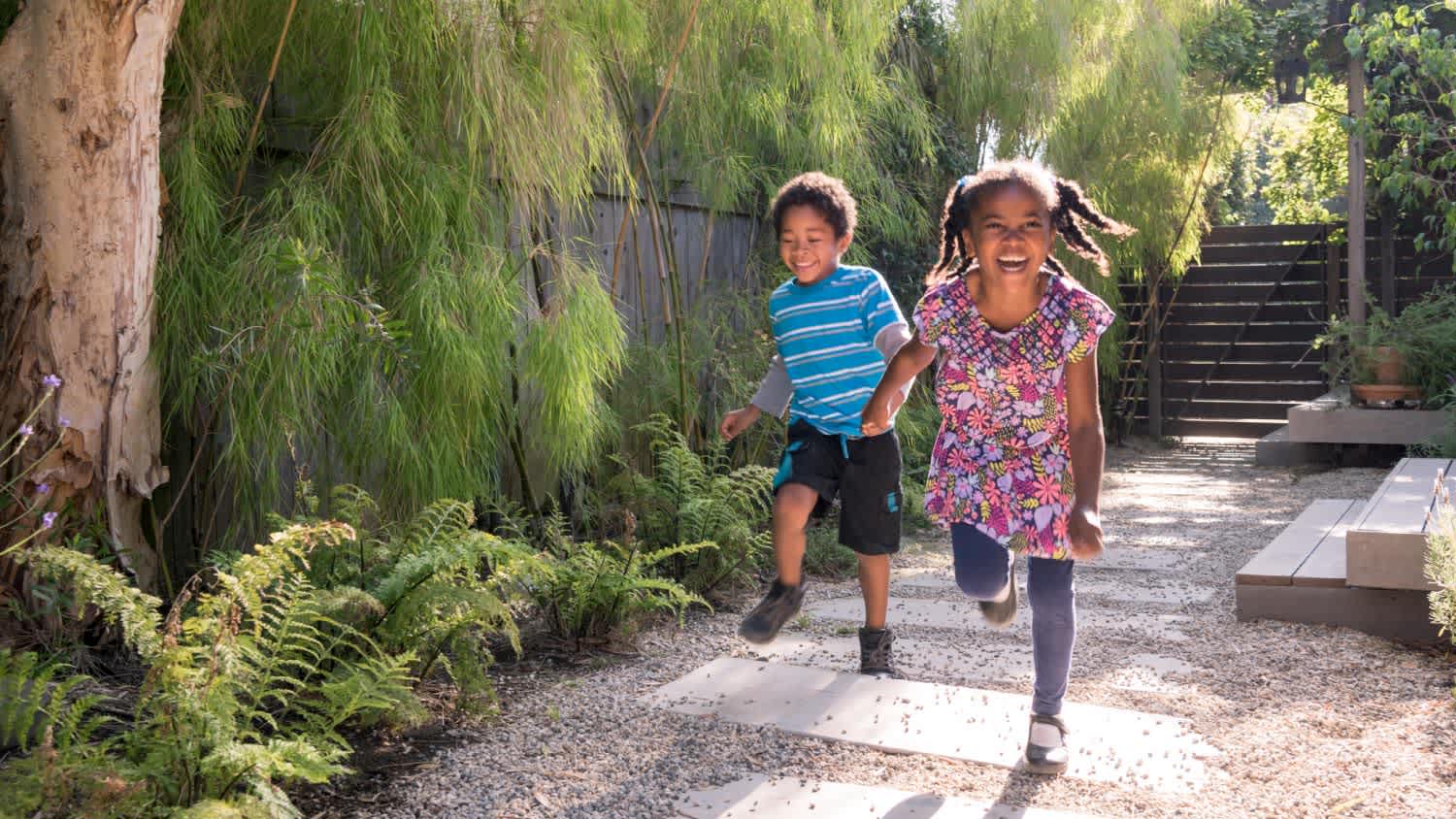children running and playing in garden