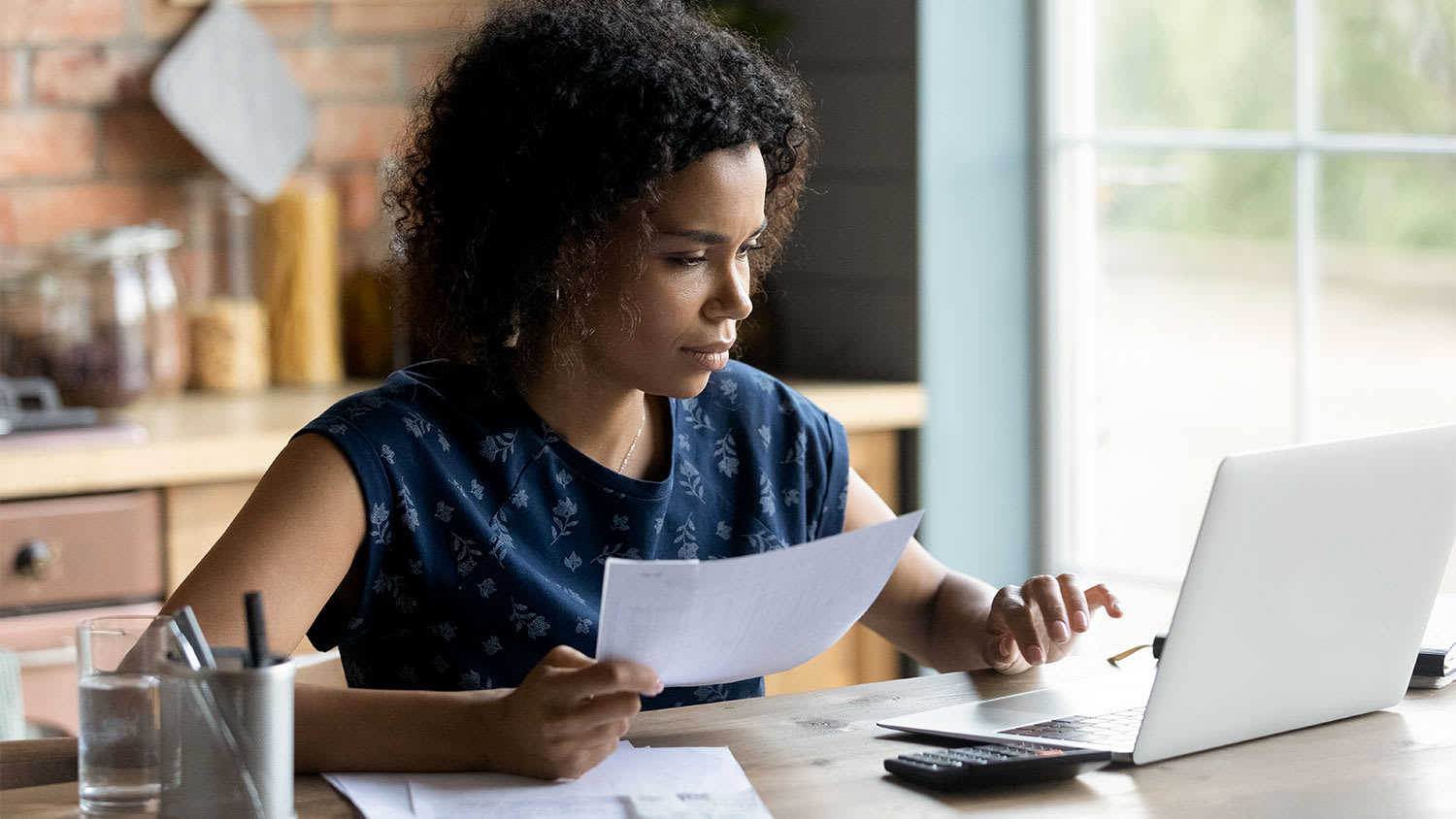 A woman looks at an estimate