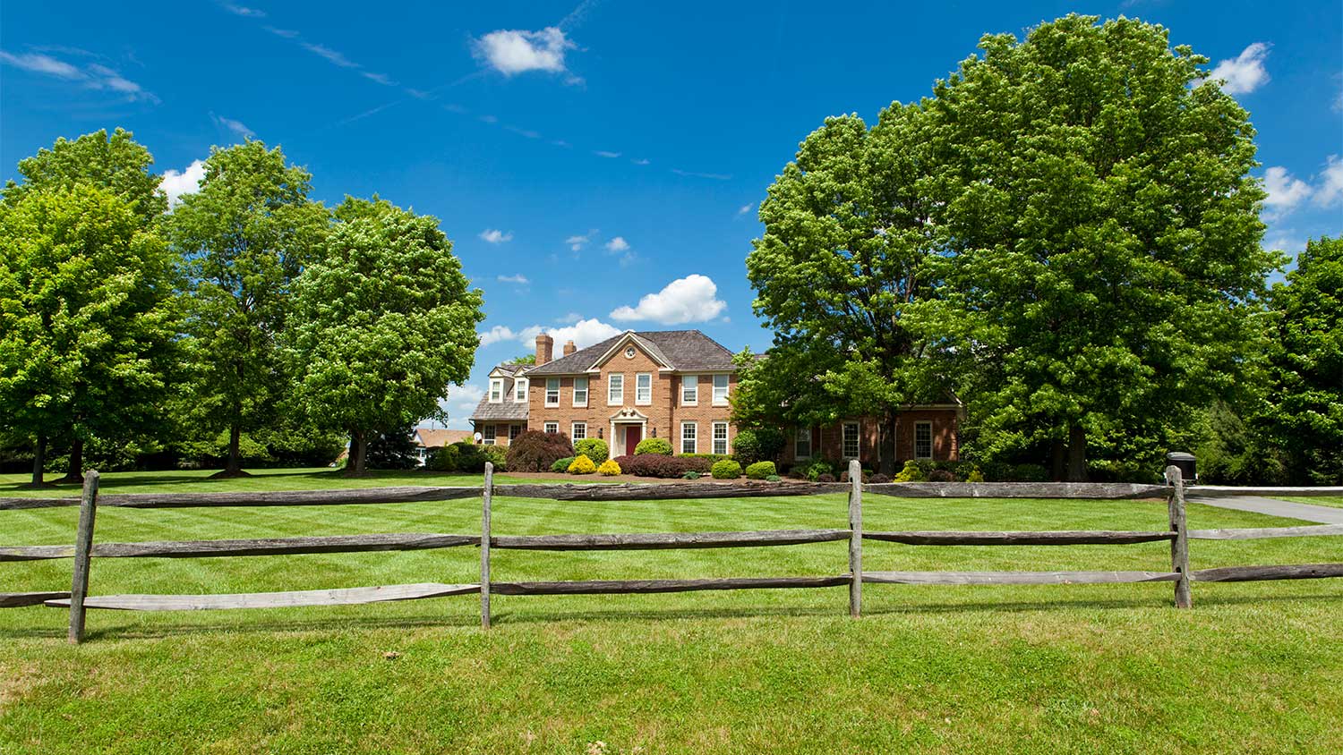 A house with a wood fence