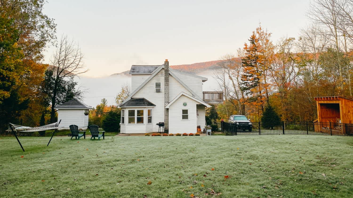 A backyard view of frosted lawn