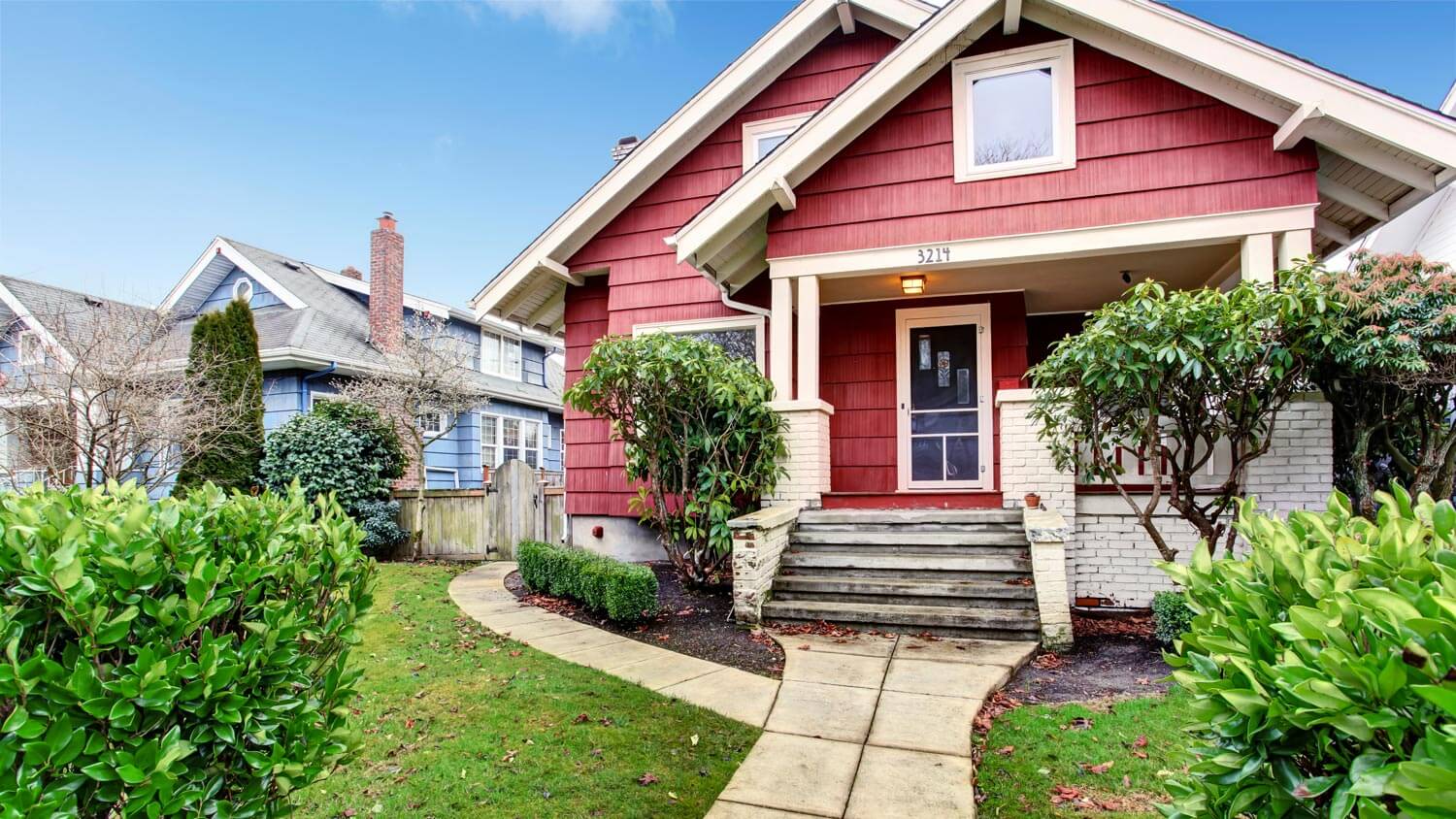 A classic red craftsman style house