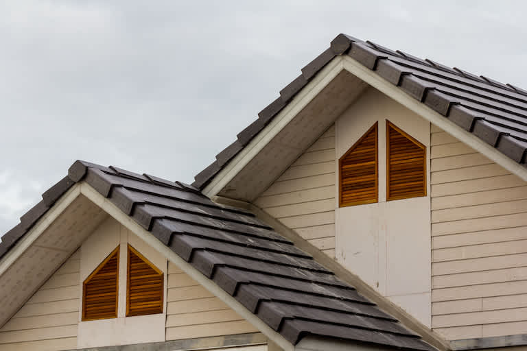 a roof covered in rubber tiles