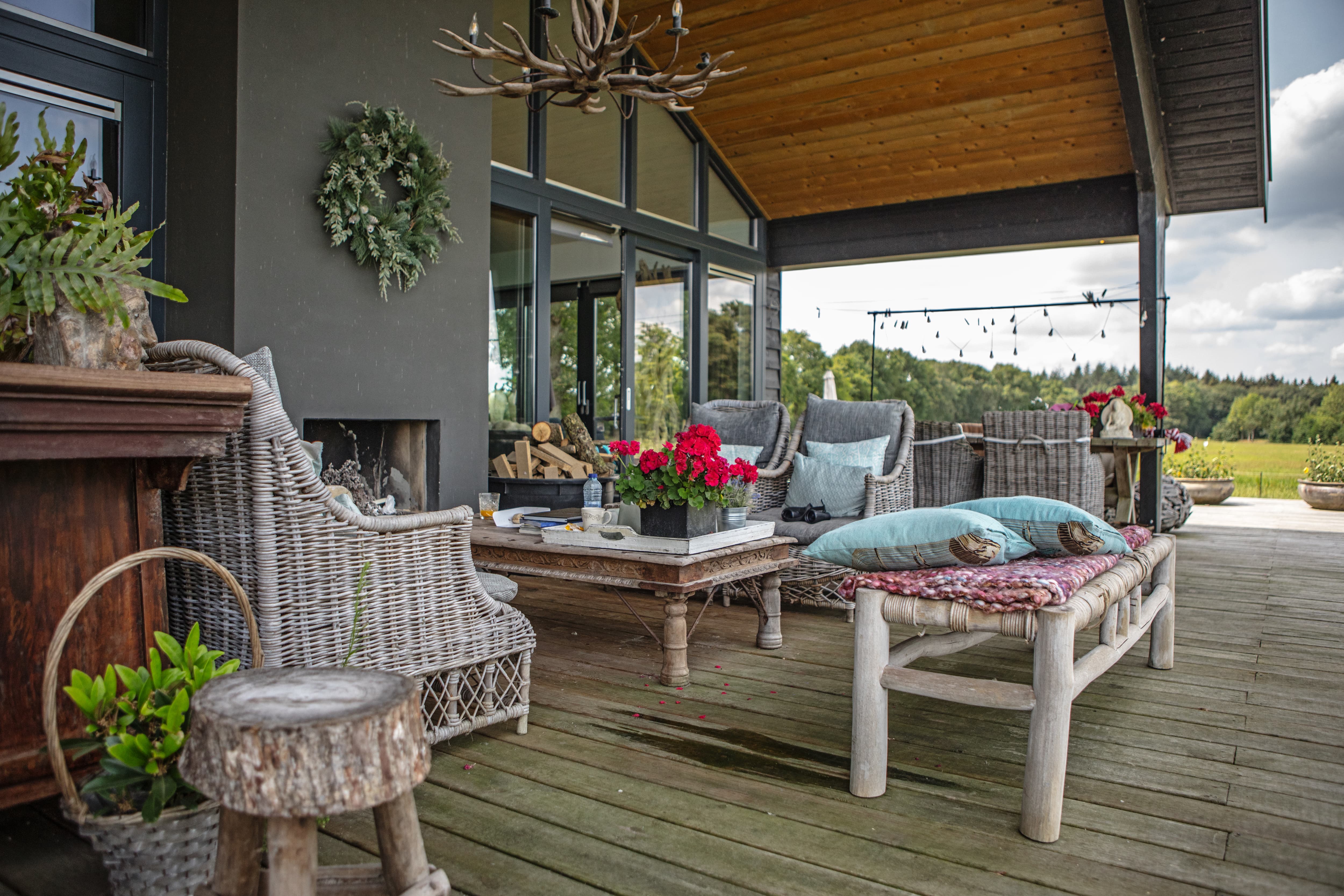 Bohemian covered porch seating area