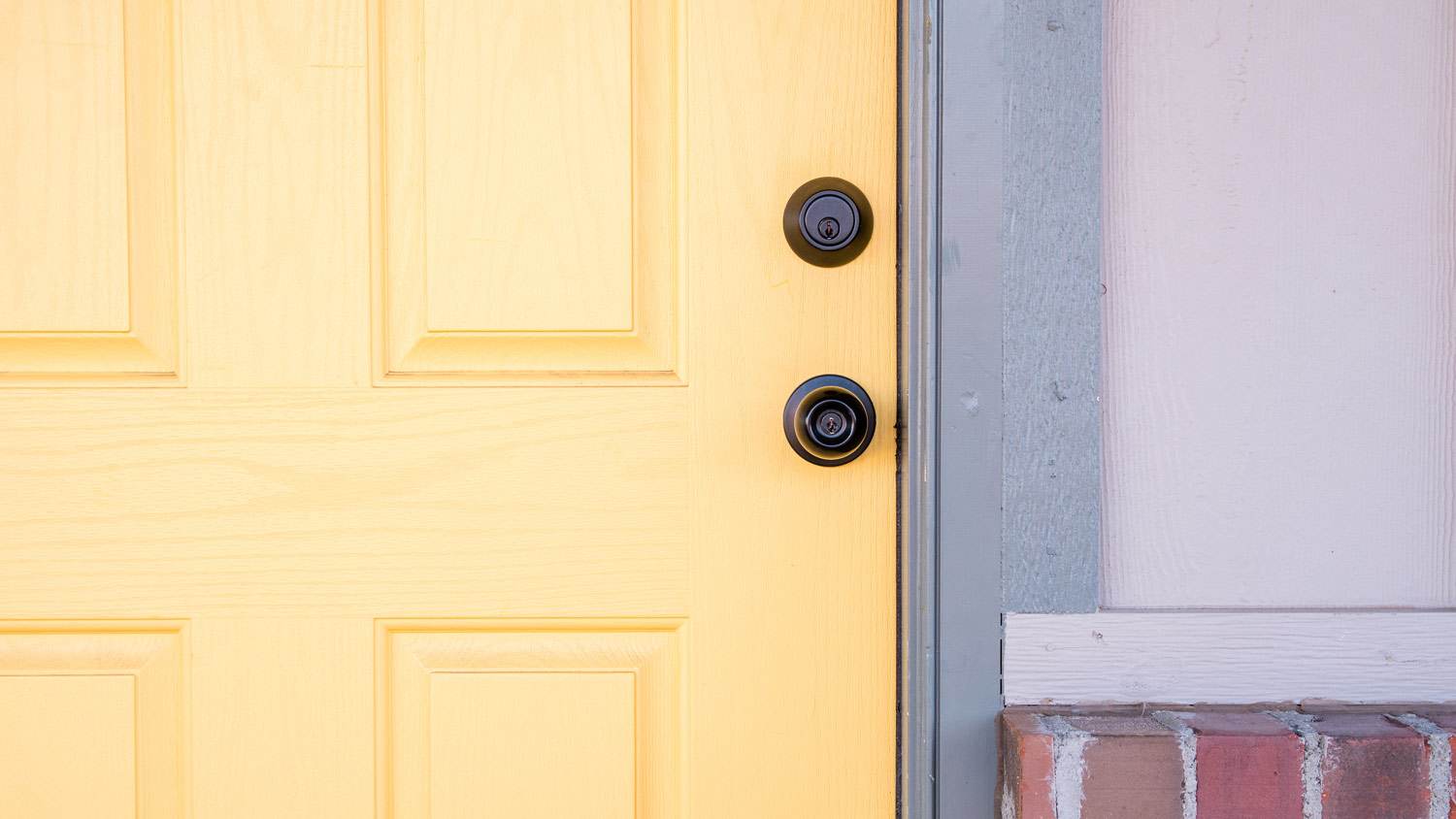 Detail shot of a yellow front door