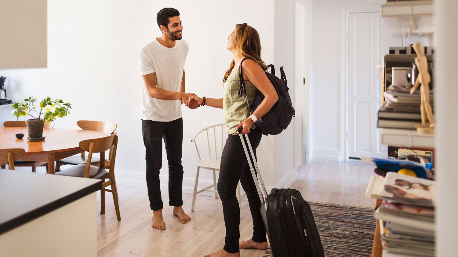 Homeowner shaking hands with a guest