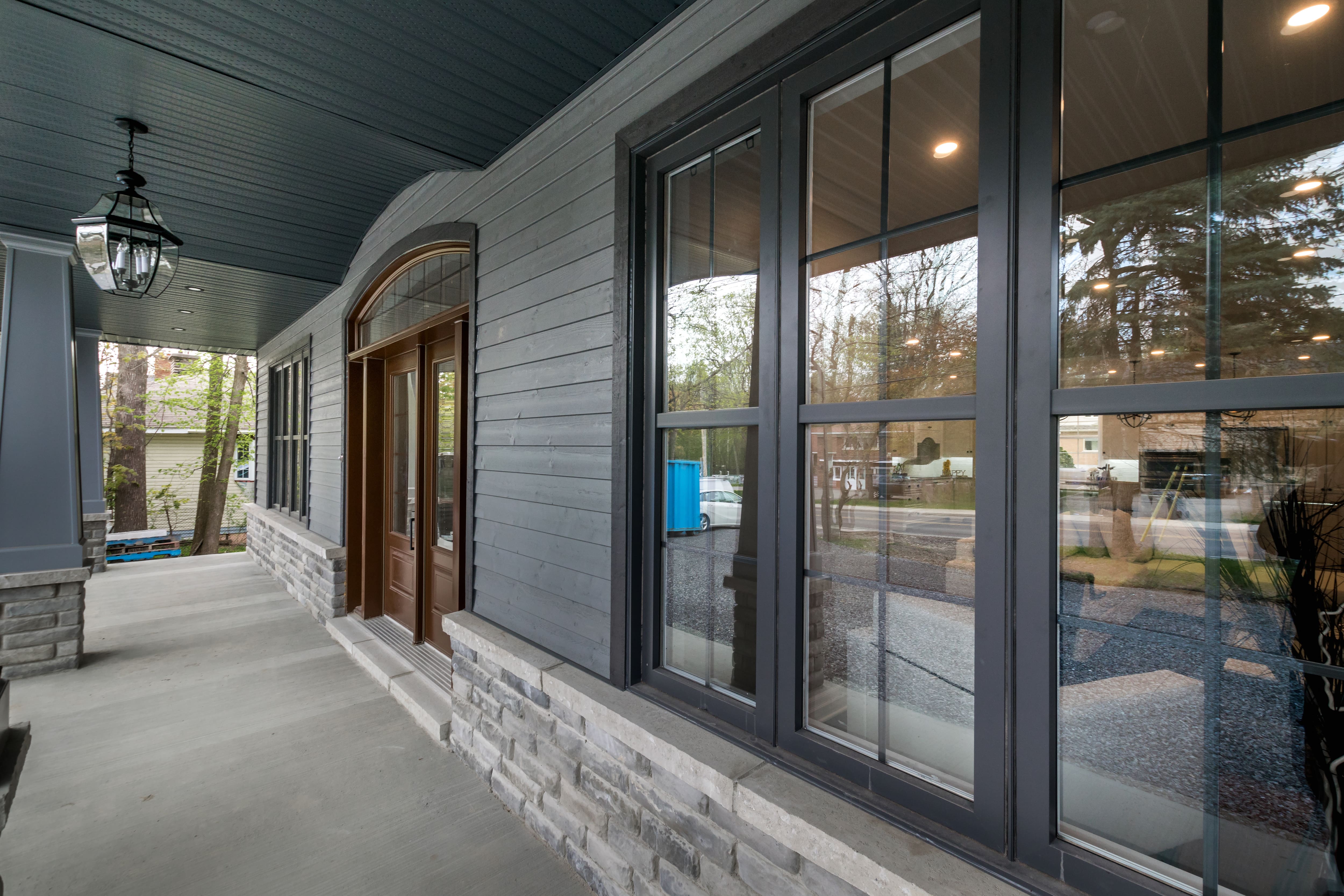 Modern luxury home with black window trim and casing