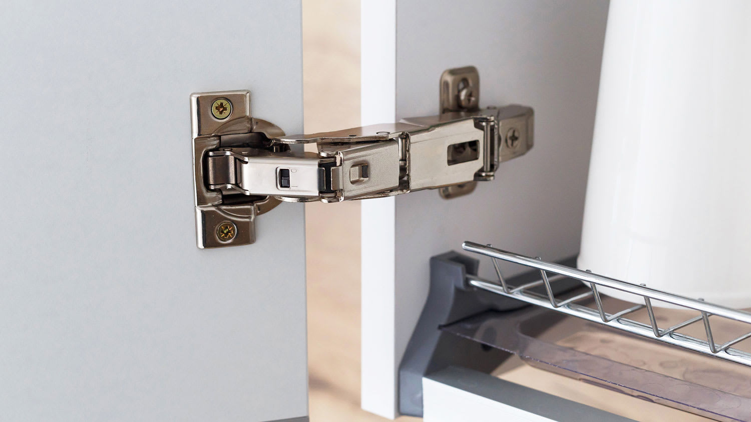 Wide angle hinge installed on a kitchen cabinet