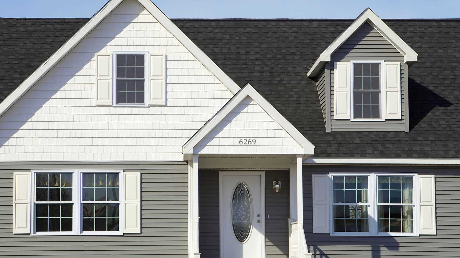 House with white shingle siding