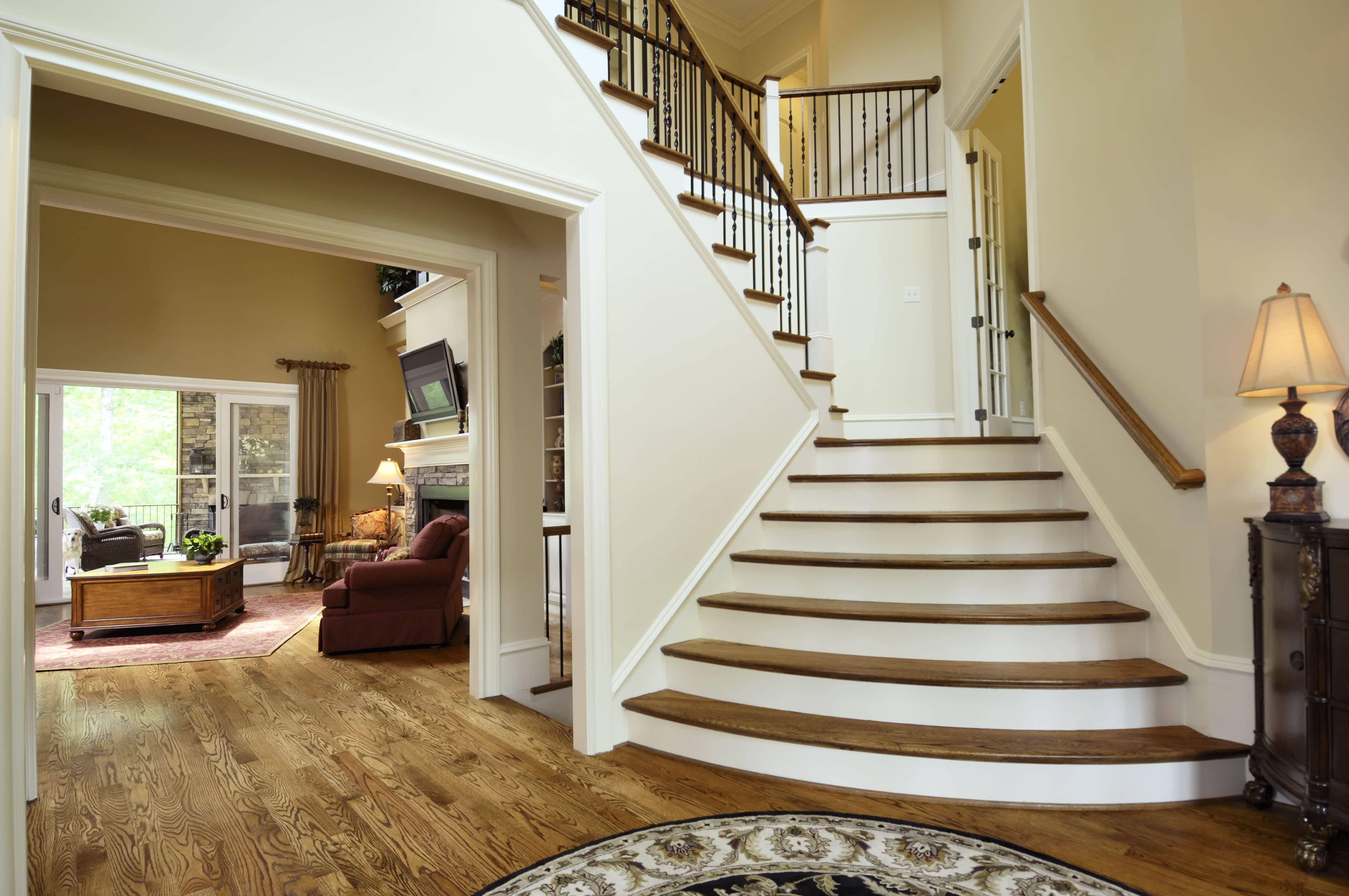 Large wooden staircase in luxury home
