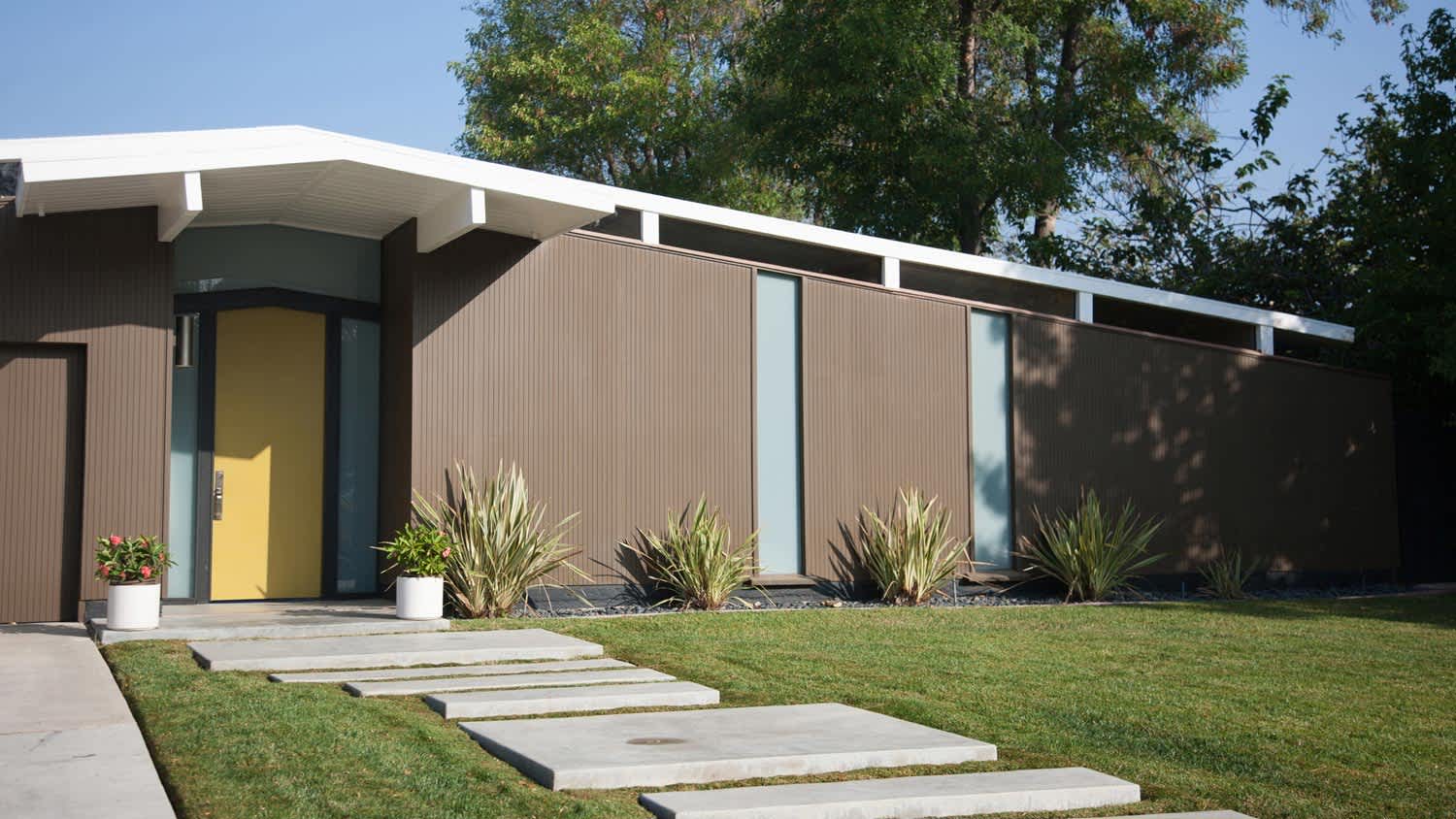 The exterior of a contemporary house on a sunny day